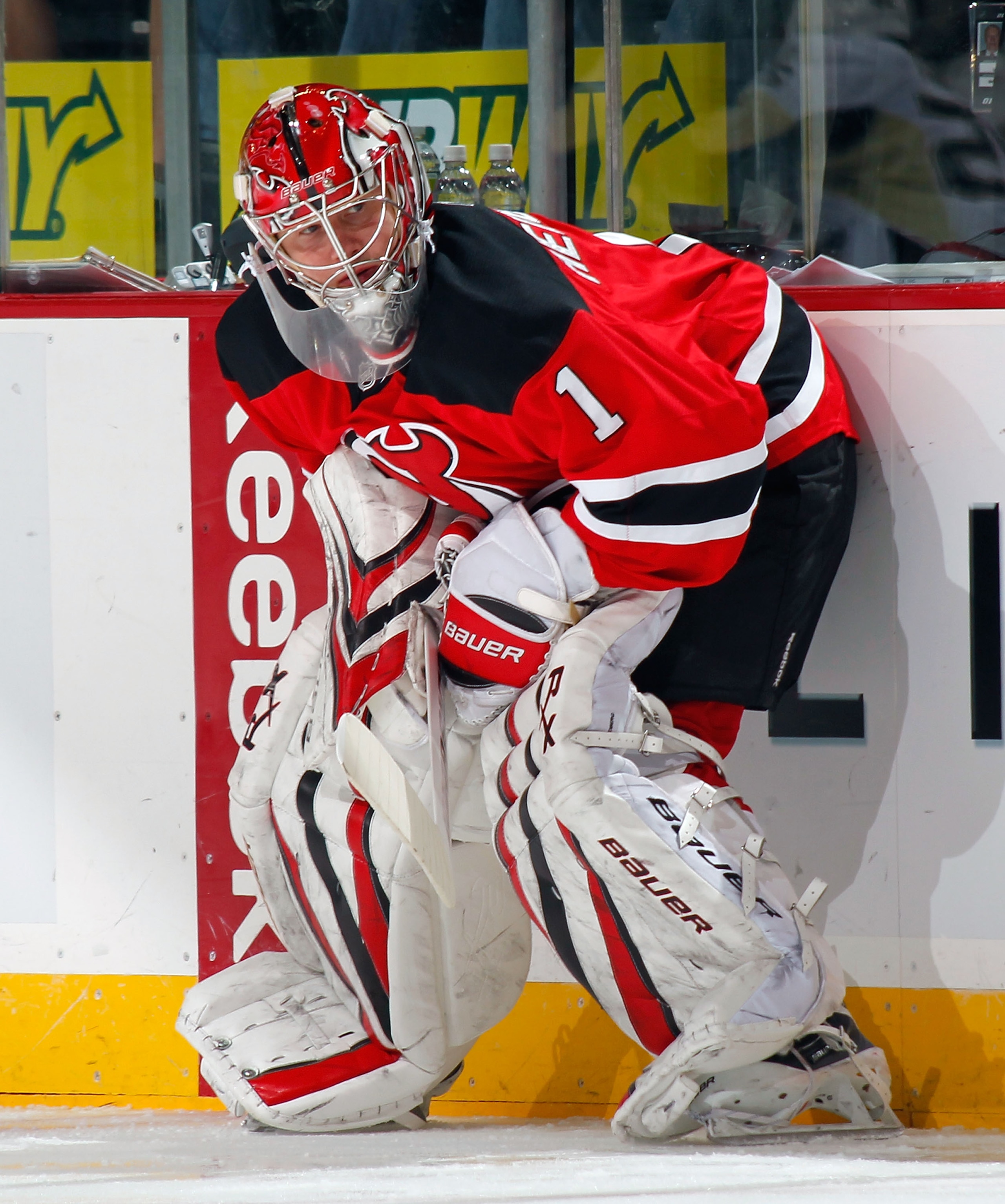 NEWARK, NJ - JANUARY 20:  Goalie Johan Hedberg #1 of the New Jersey Devils takes a break during warmups before his shutout win in an NHL hockey game against the Pittsburgh Penguins at the Prudential Center on January 20, 2011 in Newark, New Jersey.  (Phot