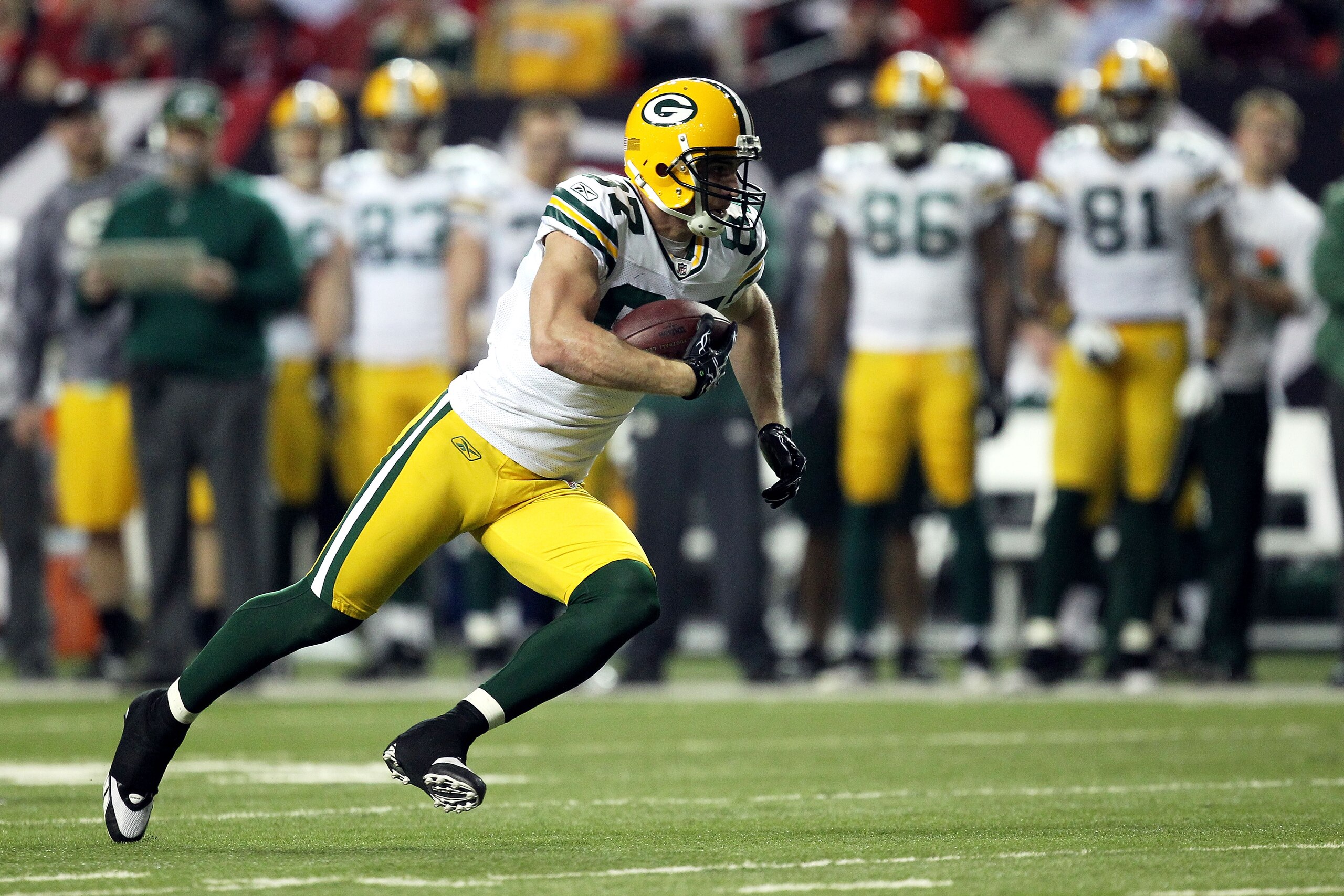 ATLANTA, GA - JANUARY 15:  Jordy Nelson #87 of the Green Bay Packers runs for yards after the catch against the Atlanta Falcons during their 2011 NFC divisional playoff game at Georgia Dome on January 15, 2011 in Atlanta, Georgia. The Packers won 48-21.