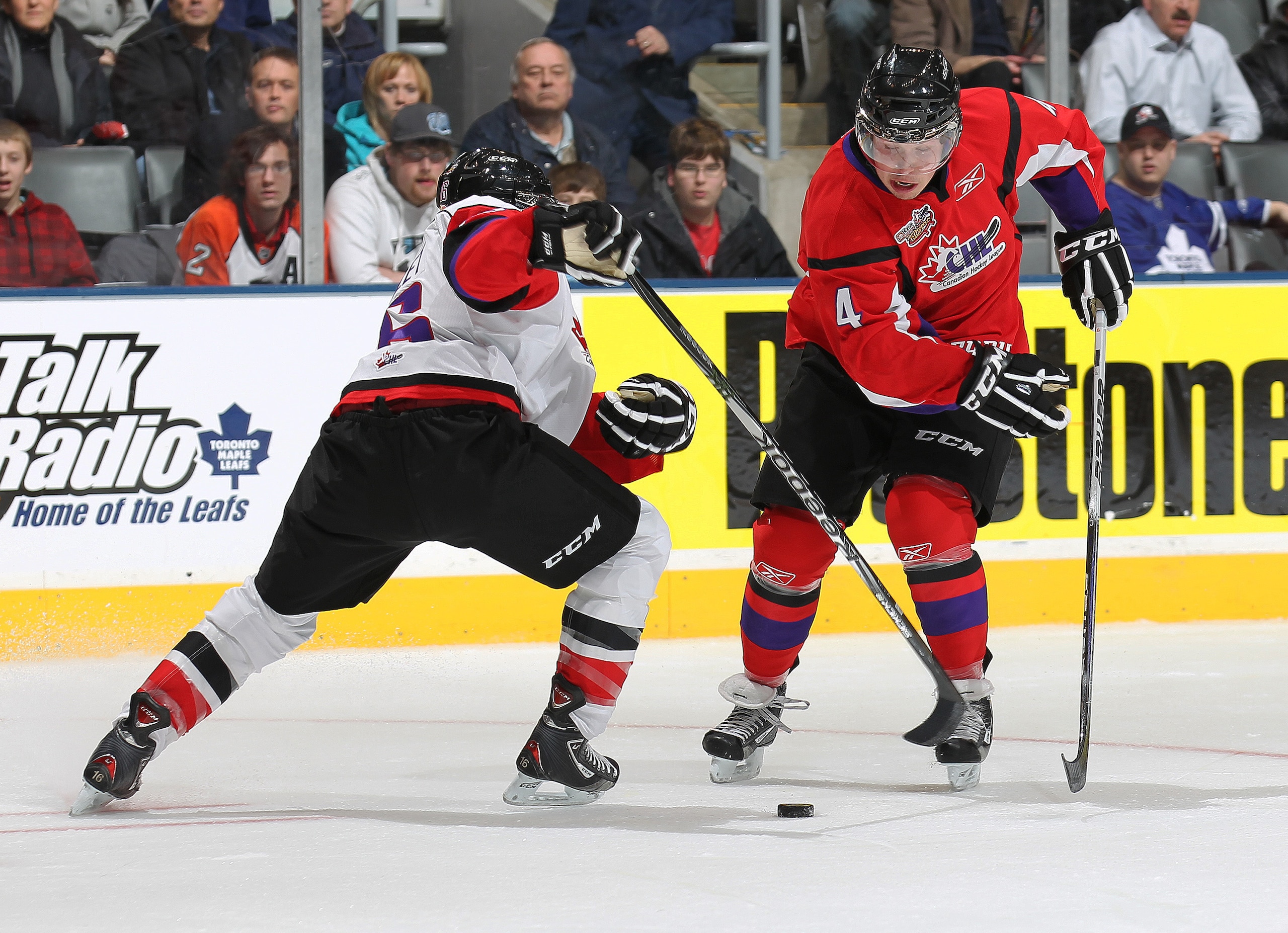 TORONTO, CAN - JANUARY 19: Myles Bell #4 of Team Cherry is checked by David Musil #6 of Team Orr in the 2011 Home Hardware Top Prospects game on January 19, 2011 at the Air Canada Centre in Toronto, Canada. Team Orr defeated Team Cherry 7-1. (Photo by Cl TORONTO, CAN - JANUARY 19: Myles Bell #4 of Team Cherry is checked by David Musil #6 of Team Orr in the 2011 Home Hardware Top Prospects game on January 19, 2011 at the Air Canada Centre in Toronto, Canada. Team Orr defeated Team Cherry 7-1. (Photo by Cl