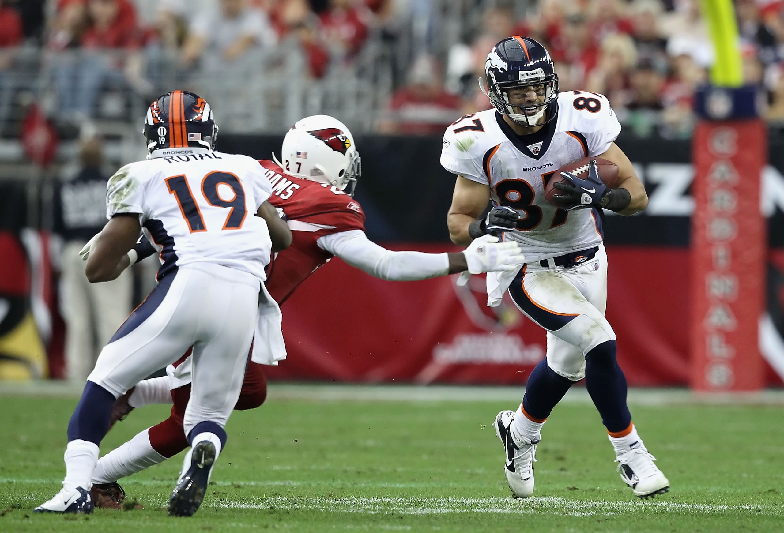 GLENDALE, AZ - DECEMBER 12:  Wide receiver Eric Decker #27 of the Denver Broncos runs with the football during the NFL game against the Arizona Cardinals at the University of Phoenix Stadium on December 12, 2010 in Glendale, Arizona.  The Cardinals defeat