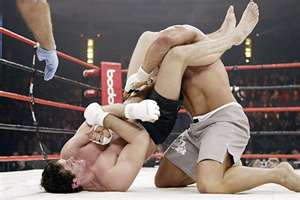 Roger Gracie securing an arm bar victory