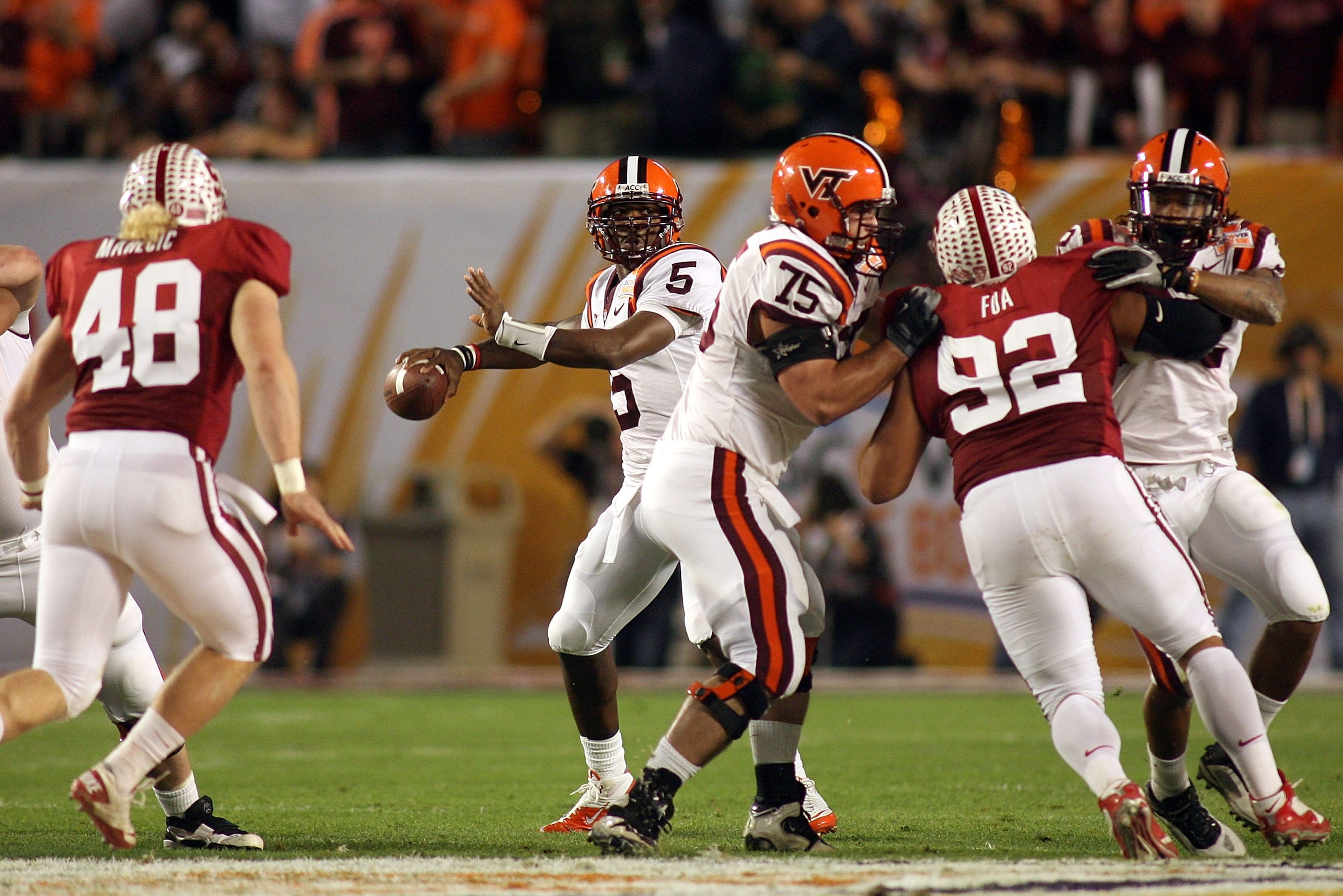 MIAMI, FL - JANUARY 03:  Tyrod Taylor #5 of the Virginia Tech Hokies throws a pass against the Stanford Cardinal during the 2011 Discover Orange Bowl at Sun Life Stadium on January 3, 2011 in Miami, Florida. Stanford won 40-12. (Photo by Marc Serota/Getty