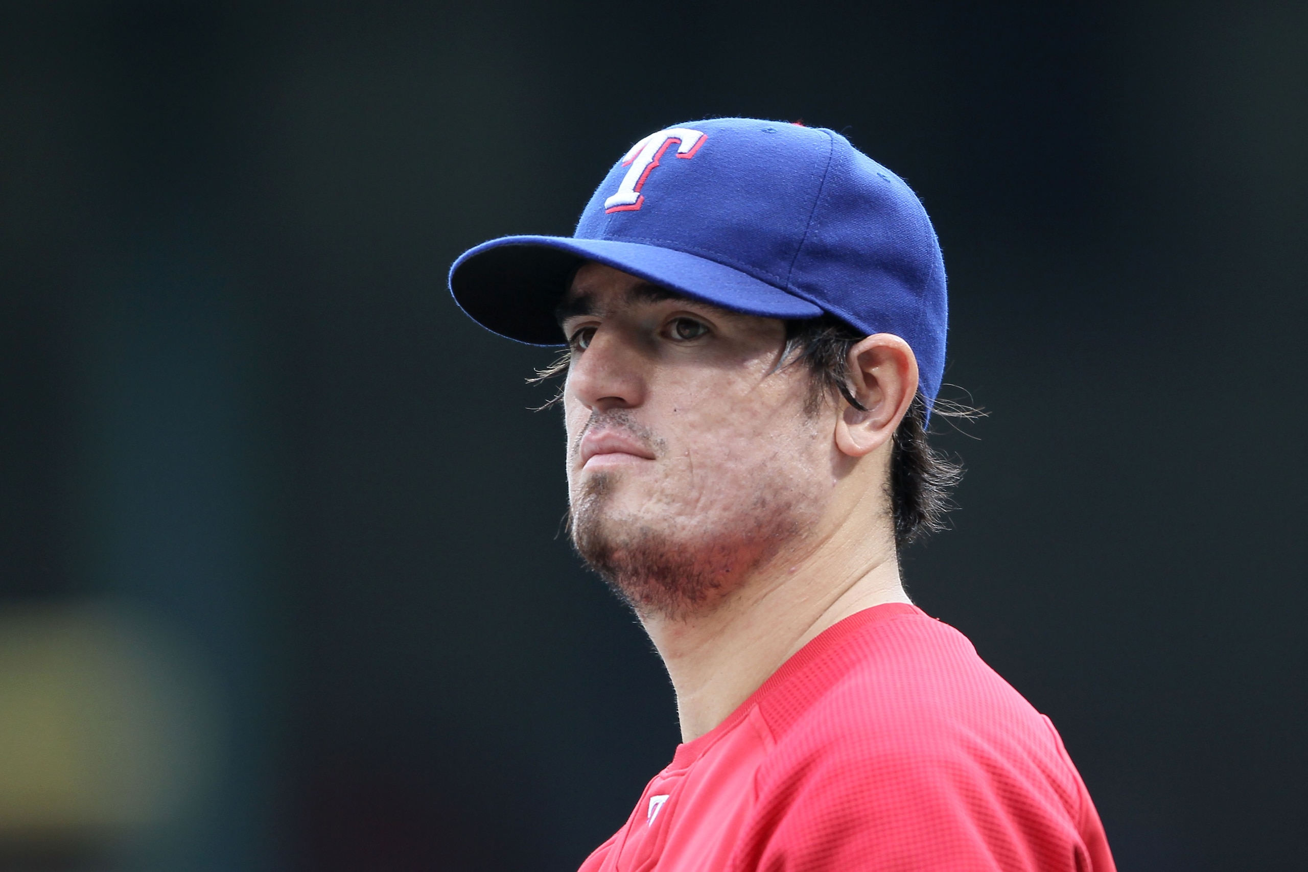 ARLINGTON, TX - OCTOBER 22:  Jorge Cantu #8 of the Texas Rangers looks on during batting practice against the New York Yankees in Game Six of the ALCS during the 2010 MLB Playoffs at Rangers Ballpark in Arlington on October 22, 2010 in Arlington, Texas.