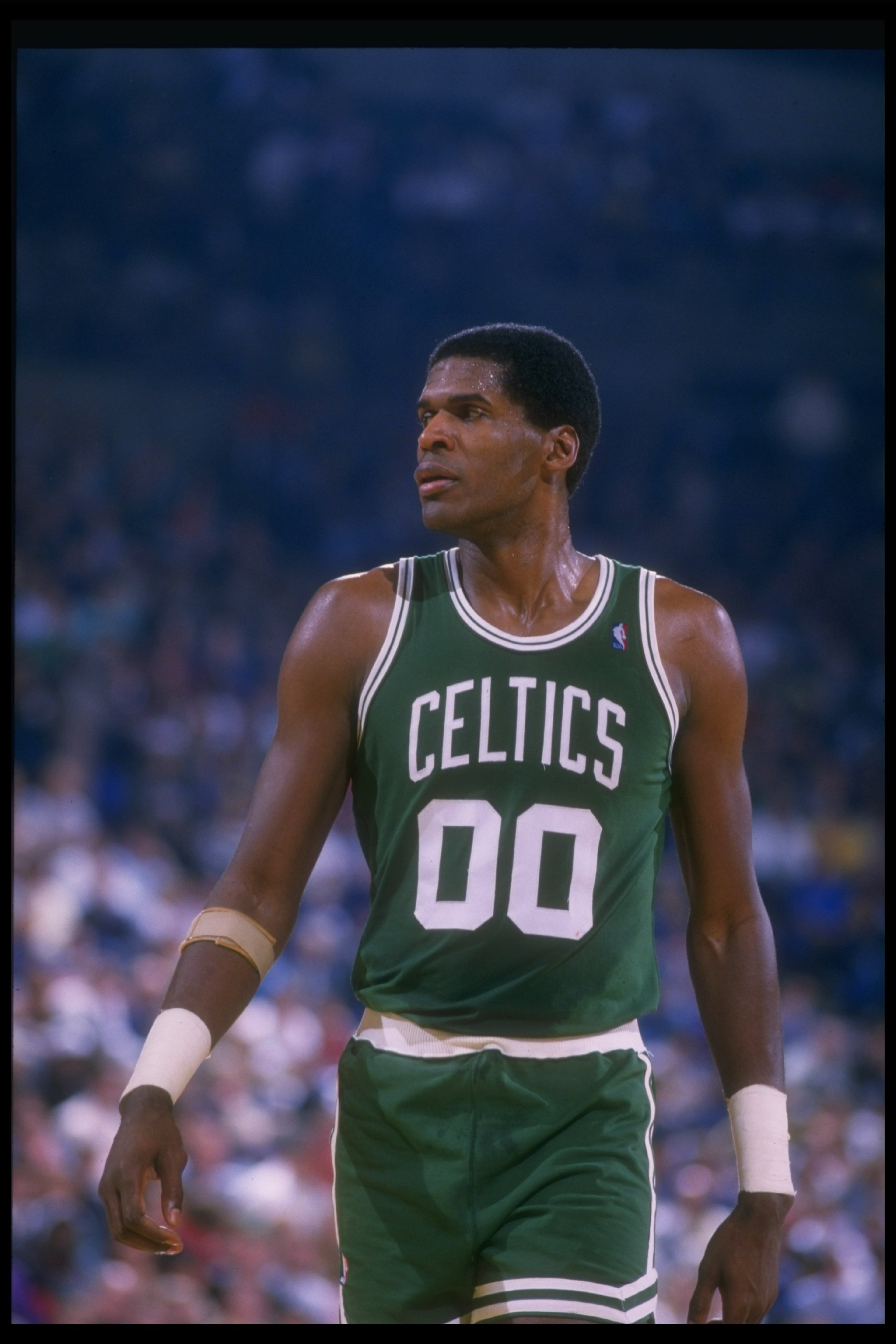 Robert Parish of the Boston Celtics looks on during a game. Robert Parish of the Boston Celtics looks on during a game.