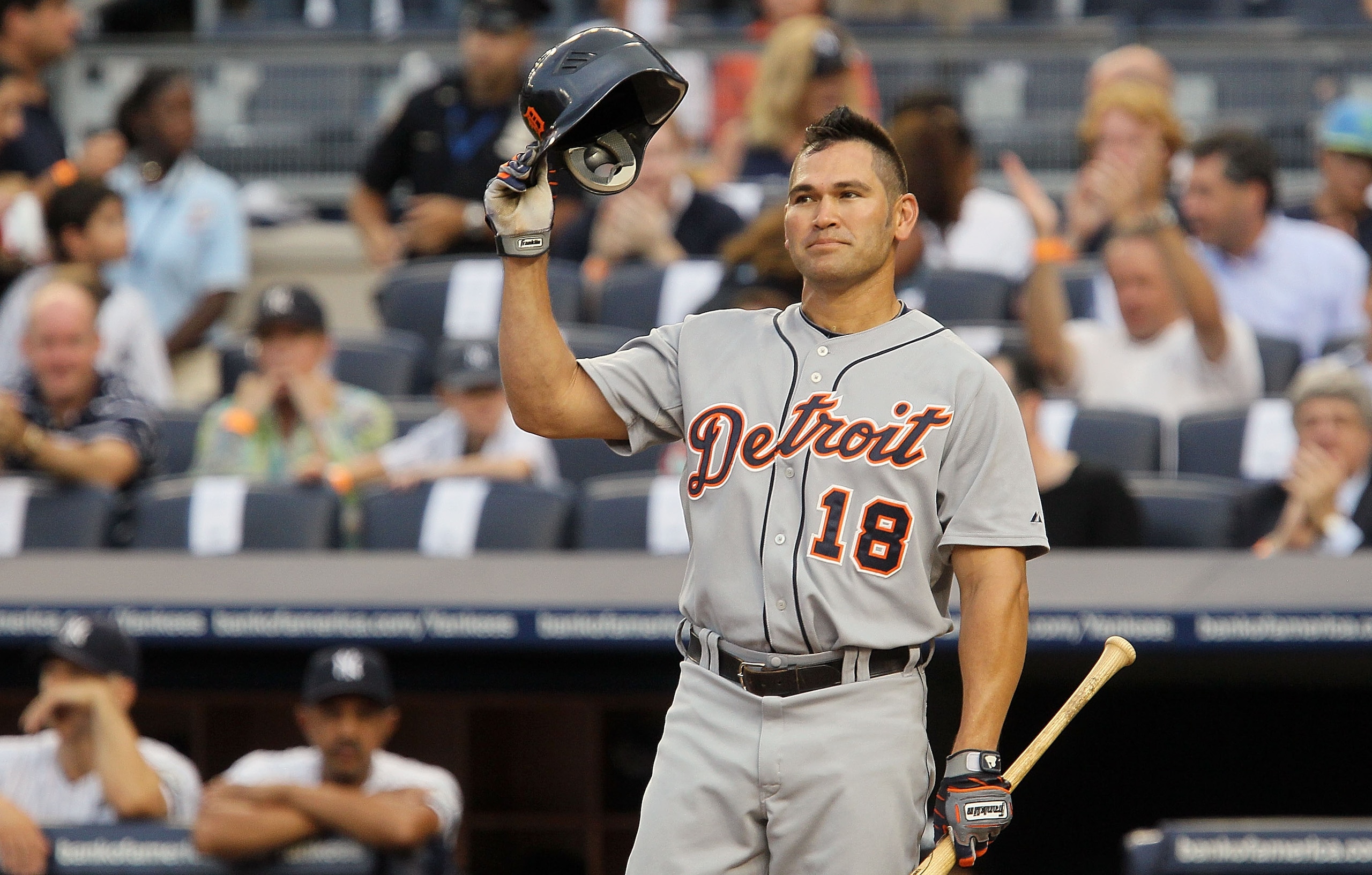 NEW YORK - AUGUST 16:  Johnny Damon #18 of the Detroit Tigers salutes the crowd prior to his first at bat against the New York Yankees on August 16, 2010 at Yankee Stadium in the Bronx borough of New York City.  (Photo by Jim McIsaac/Getty Images)