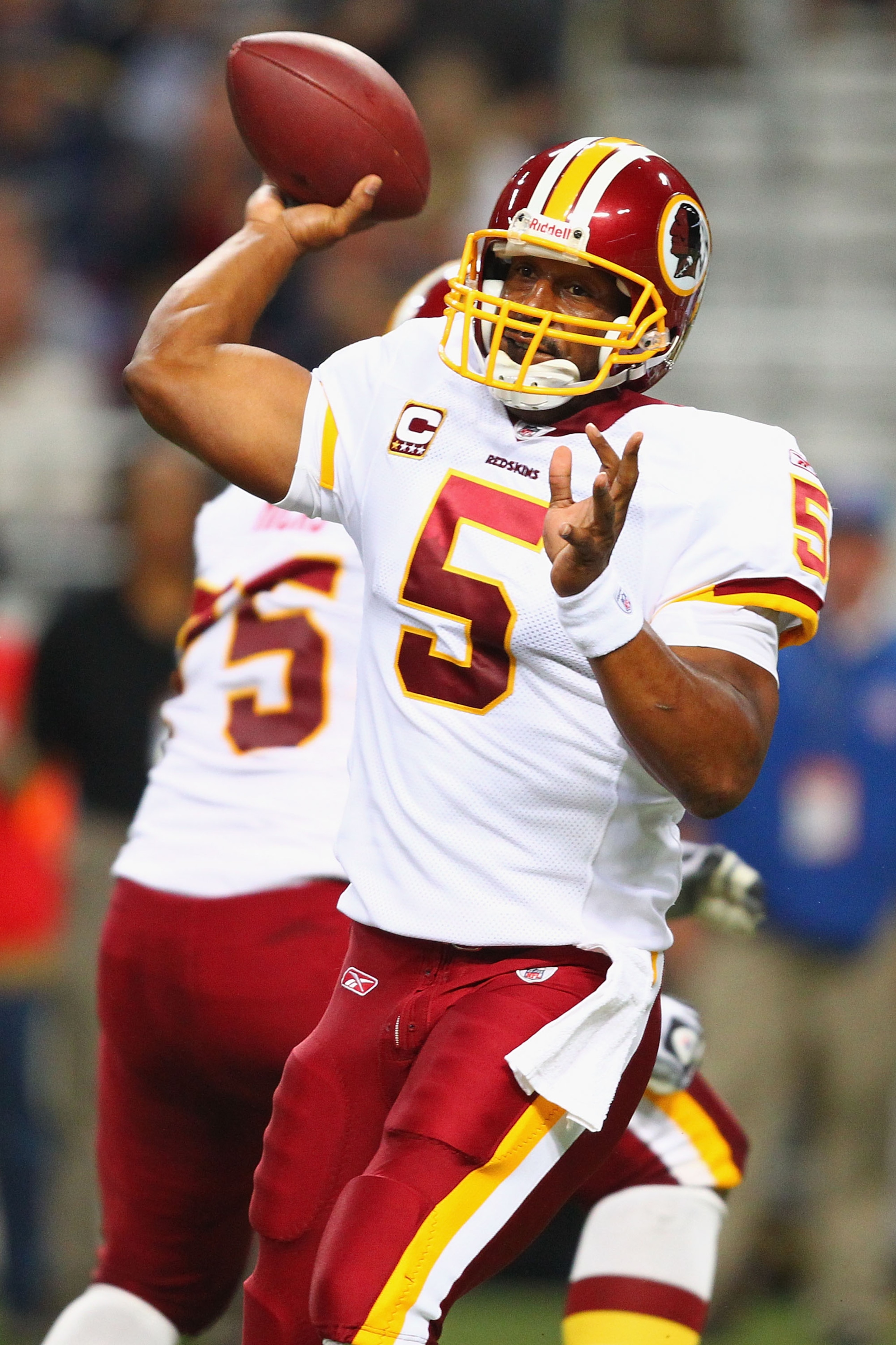 ST. LOUIS - SEPTEMBER 26: Donavan McNabb #5 of the Washington Redskins passes against the St. Louis Rams at the Edward Jones Dome on September 26, 2010 in St. Louis, Missouri. The Rams beat the Redskins 30-16. (Photo by Dilip Vishwanat/Getty Images) ST. LOUIS - SEPTEMBER 26: Donavan McNabb #5 of the Washington Redskins passes against the St. Louis Rams at the Edward Jones Dome on September 26, 2010 in St. Louis, Missouri. The Rams beat the Redskins 30-16. (Photo by Dilip Vishwanat/Getty Images)