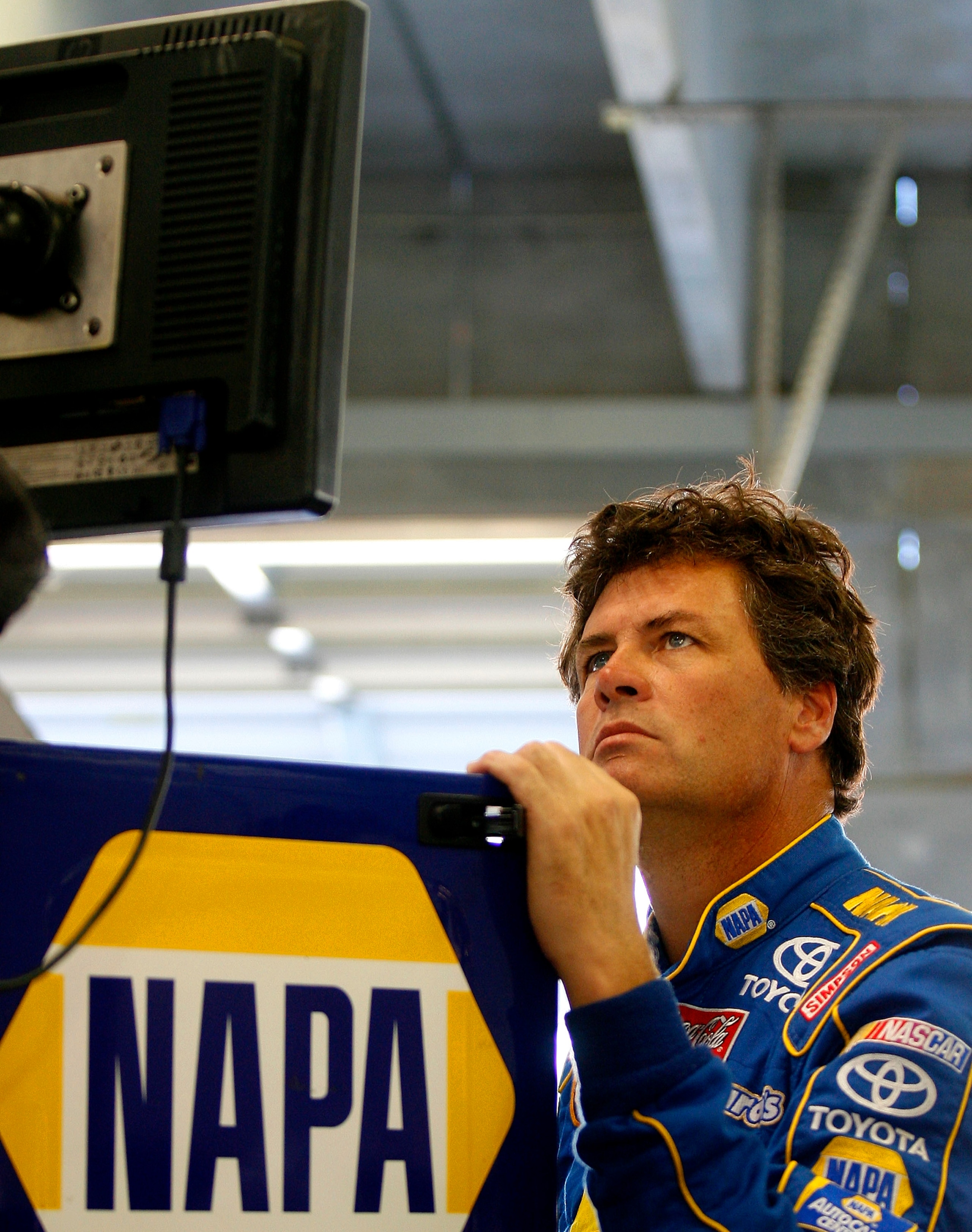 HAMPTON, GA - OCTOBER 25:  Michael Waltrip, driver of the #55 NAPA Auto Parts Toyota, views the scoring monitor during practice for the NASCAR Sprint Cup Series Pep Boys Auto 500 at Atlanta Motor Speedway on October 25, 2008 in Hampton, Georgia.  (Photo b