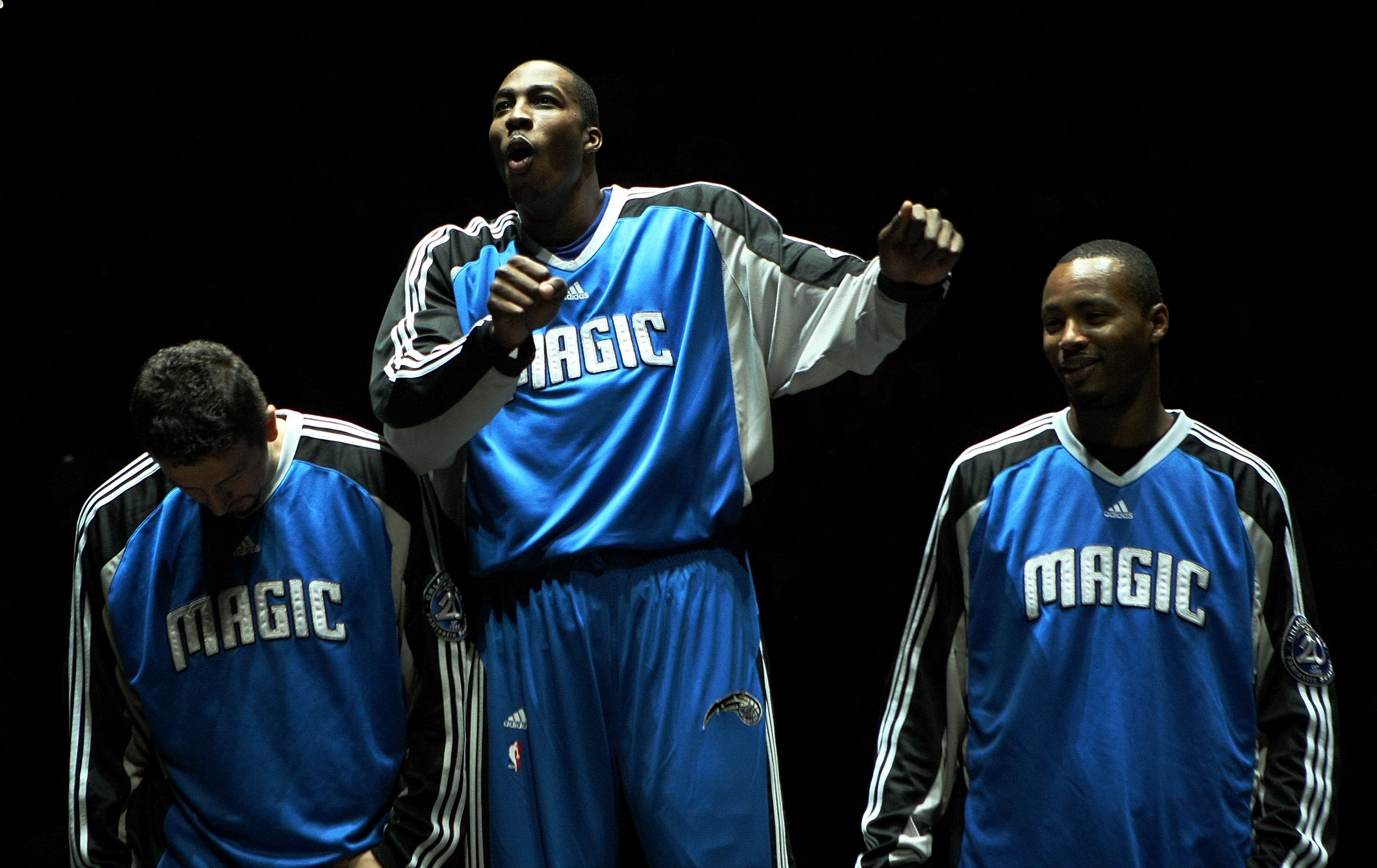 ORLANDO, FL - OCTOBER 29:  Dwight Howard #12 of the Orlando Magic dances as he is introduced along with teammates Hedo Turkoglu #15  (L) and Rashard Lewis #9 before taking on the Atlanta Hawks at Amway Arena on October 29, 2008 in Orlando, Florida. The Ha
