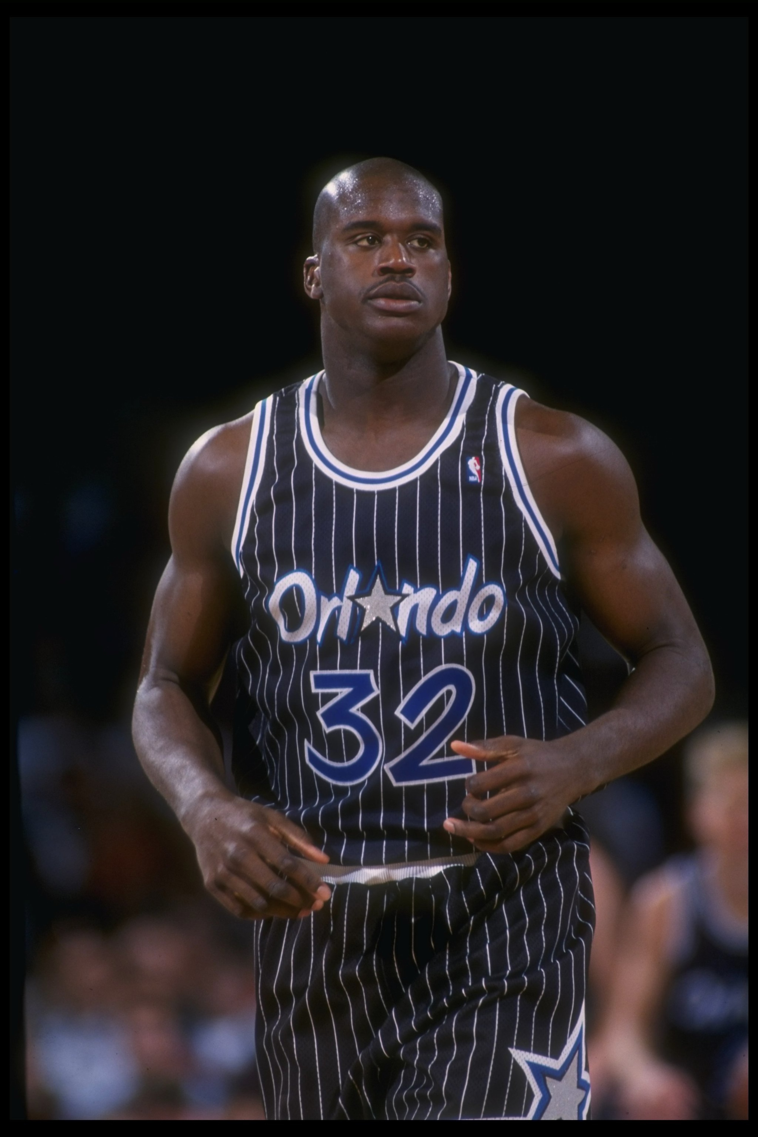 1992-1993: Center Shaquille O''Neal of the Orlando Magic looks on during a game against the Denver Nuggets at McNichols Arena in Denver, Colorado. Mandatory Credit: Tim DeFrisco /Allsport Mandatory Credit: Tim DeFrisco /Allsport 1992-1993: Center Shaquille O''Neal of the Orlando Magic looks on during a game against the Denver Nuggets at McNichols Arena in Denver, Colorado. Mandatory Credit: Tim DeFrisco /Allsport Mandatory Credit: Tim DeFrisco /Allsport
