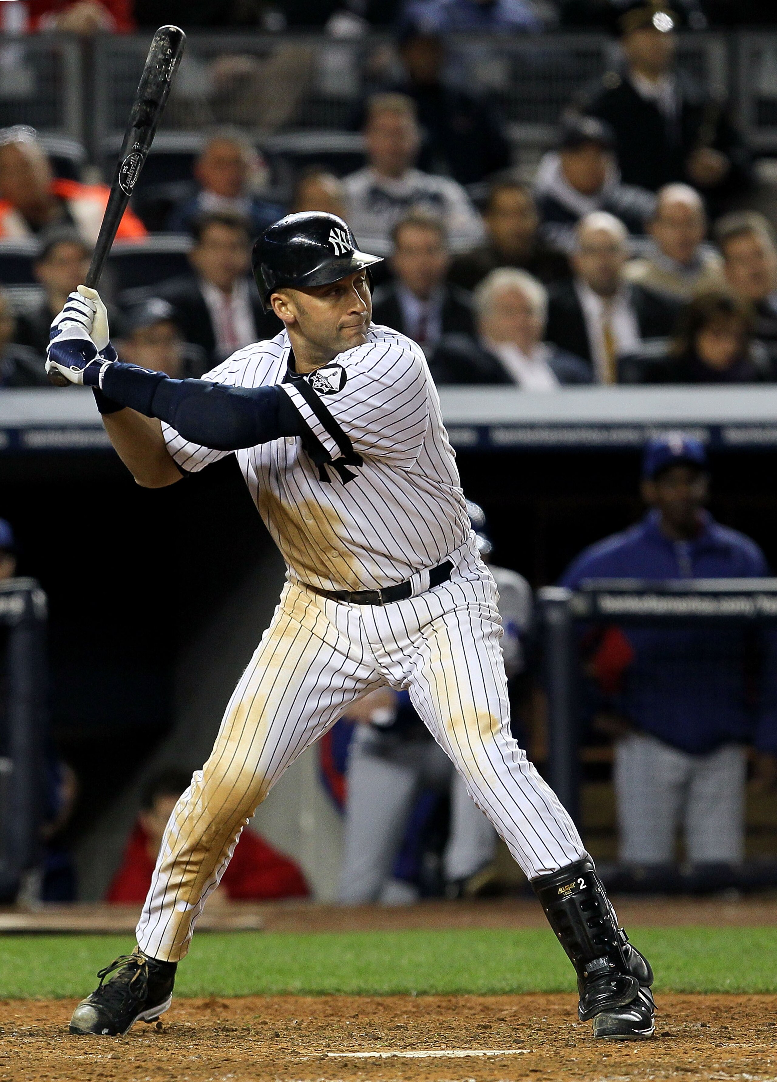 NEW YORK - OCTOBER 19:  Derek Jeter #2 of the New York Yankees bats against the Texas Rangers in Game Four of the ALCS during the 2010 MLB Playoffs at Yankee Stadium on October 19, 2010 in the Bronx borough of New York City. The Rangers won 10-3. (Photo b