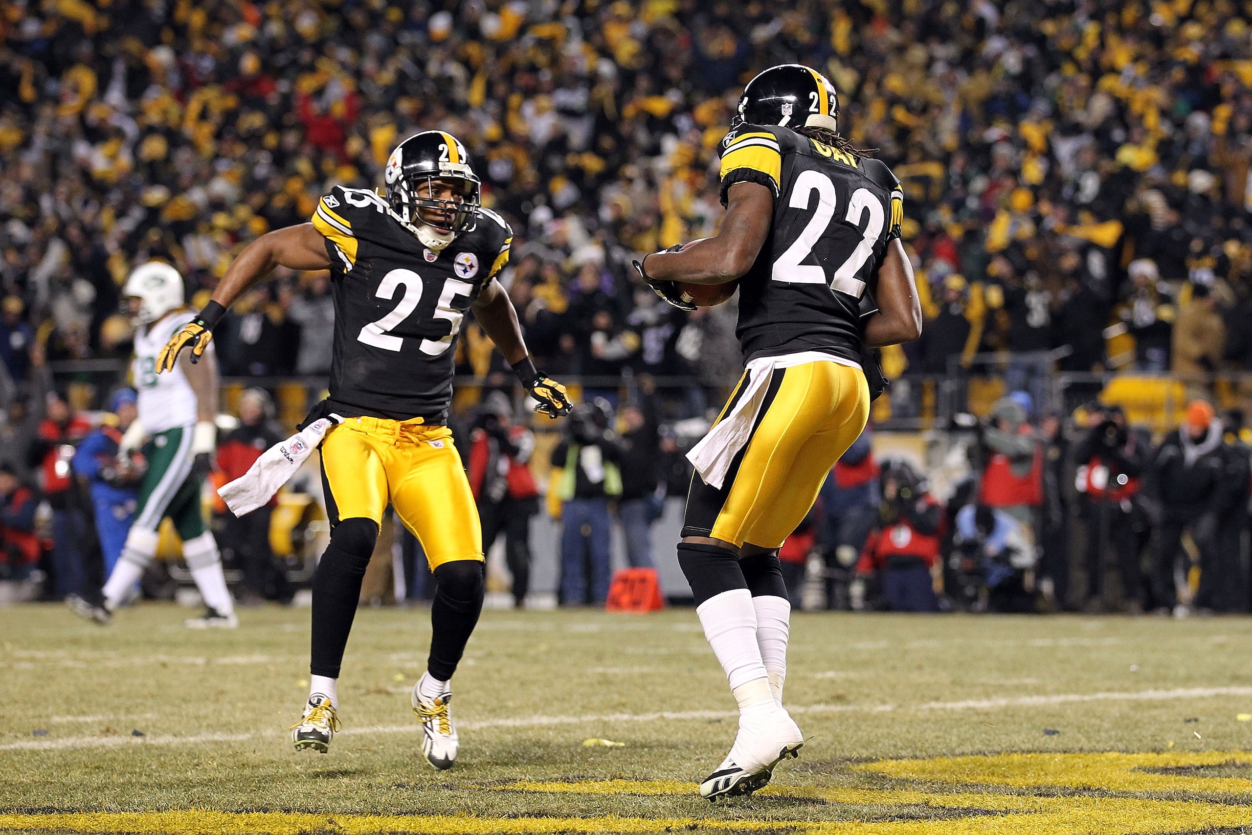 PITTSBURGH, PA - JANUARY 23:  William Gay #22 and Ryan Clark #25 of the Pittsburgh Steelers celebrate Gay's second quarter touchdown scored after Mark Sanchez #6 of the New York Jets fumbled during the 2011 AFC Championship game at Heinz Field on January