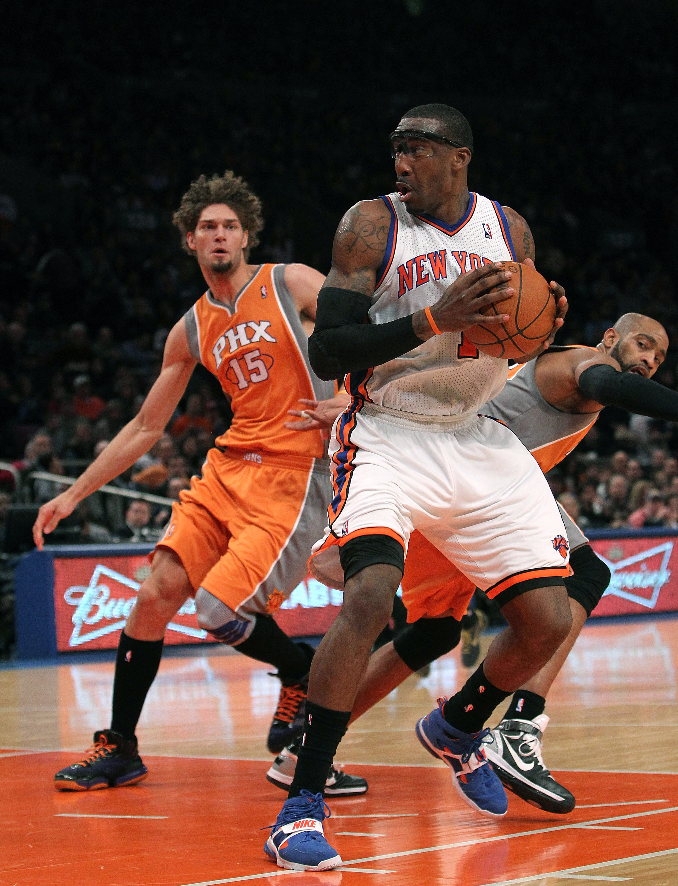 NEW YORK, NY - JANUARY 17:  Amar'e Stoudemire #1 of the New York Knicks goes to the basket against the Phoenix Suns at Madison Square Garden on January 17, 2011 in New York City. NOTE TO USER: User expressly acknowledges and agrees that, by downloading an