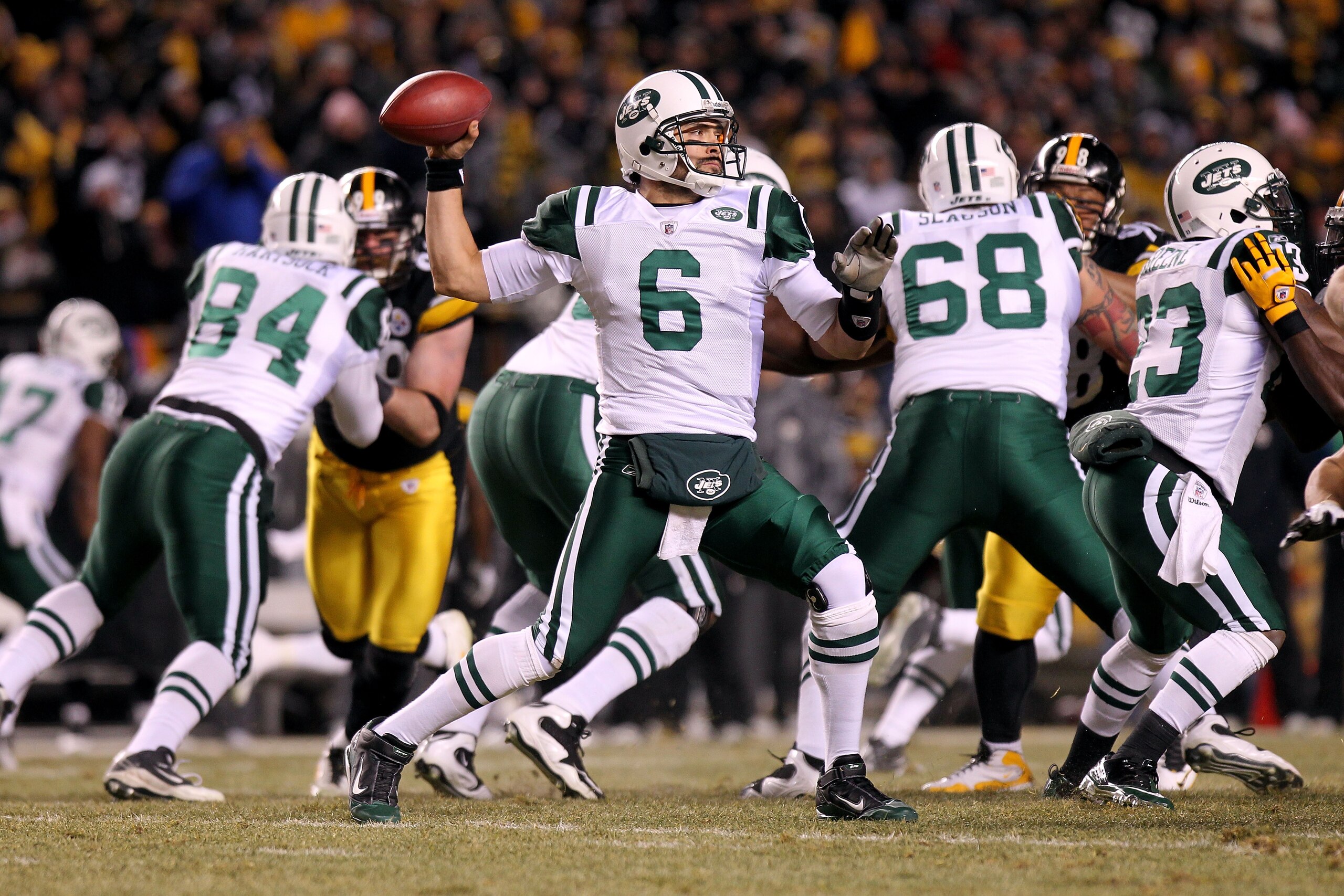 PITTSBURGH, PA - JANUARY 23:  Mark Sanchez #6 of the New York Jets drops back to pass against the Pittsburgh Steelers during the 2011 AFC Championship game at Heinz Field on January 23, 2011 in Pittsburgh, Pennsylvania.  (Photo by Nick Laham/Getty Images)
