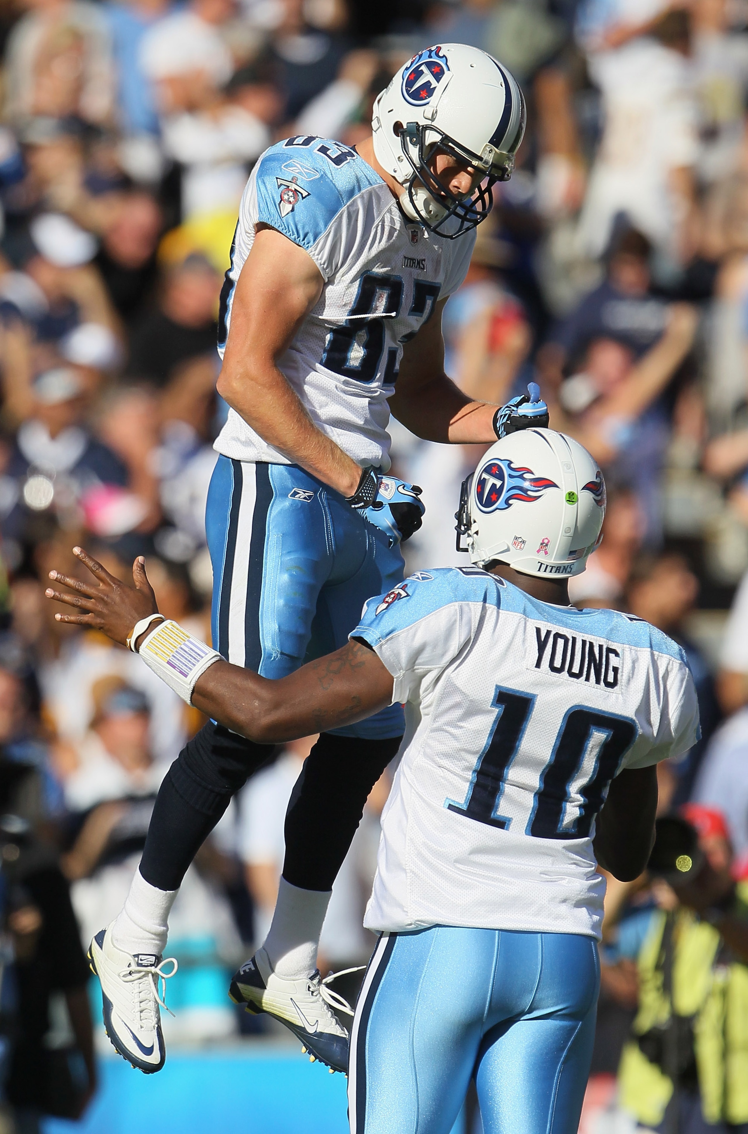 SAN DIEGO - OCTOBER 31:  Marc Mariani #83 of the Tennessee Titans jumps into the arms of quarterback Vince Young #10 after Young threw a touchdown pass against the San Diego Chargers in the fourth quarter at Qualcomm Stadium on October 31, 2010 in San Die