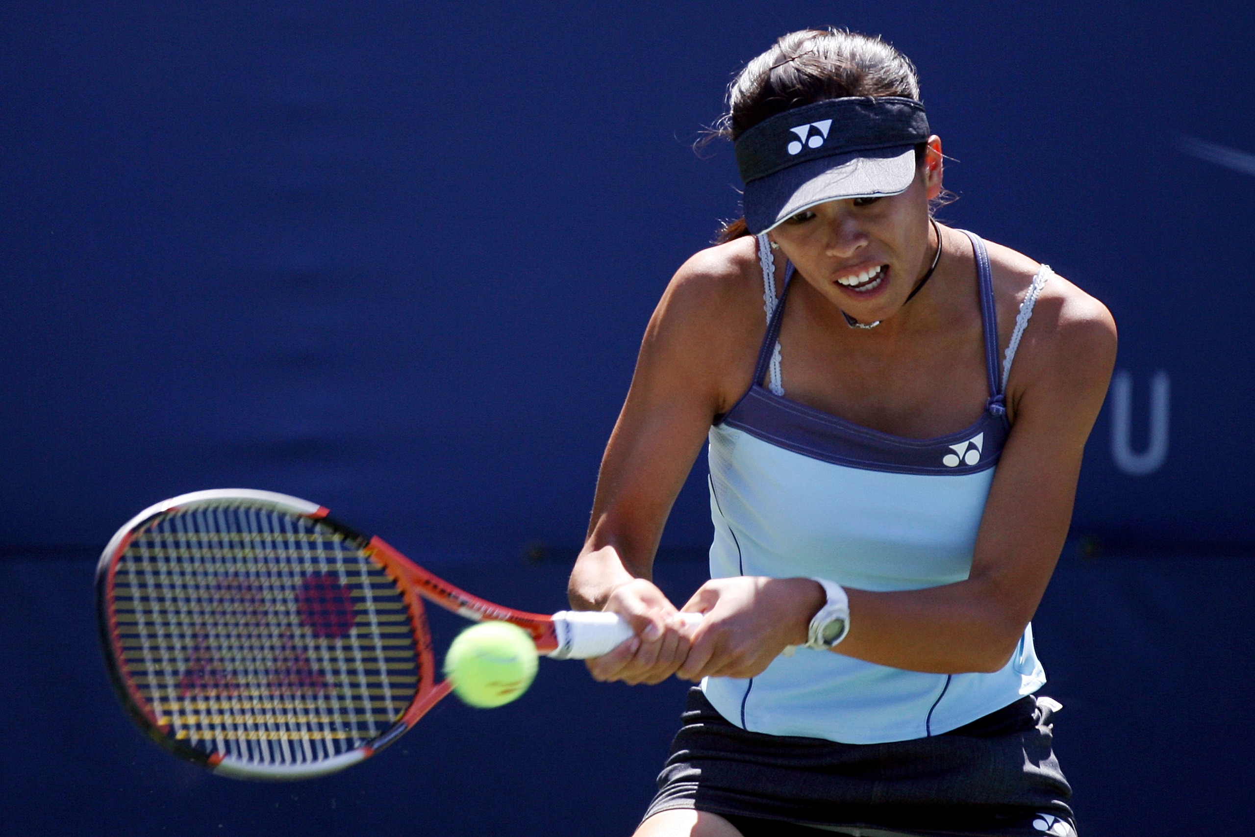 NEW YORK - AUGUST 26:  Su-Wei Hsieh of Taiwan returns a shot against Evgeniya Rodina of Russia during Day 2 of the 2008 U.S. Open at the USTA Billie Jean King National Tennis Center on August 26, 2008 in the Flushing neighborhood of the Queens borough of