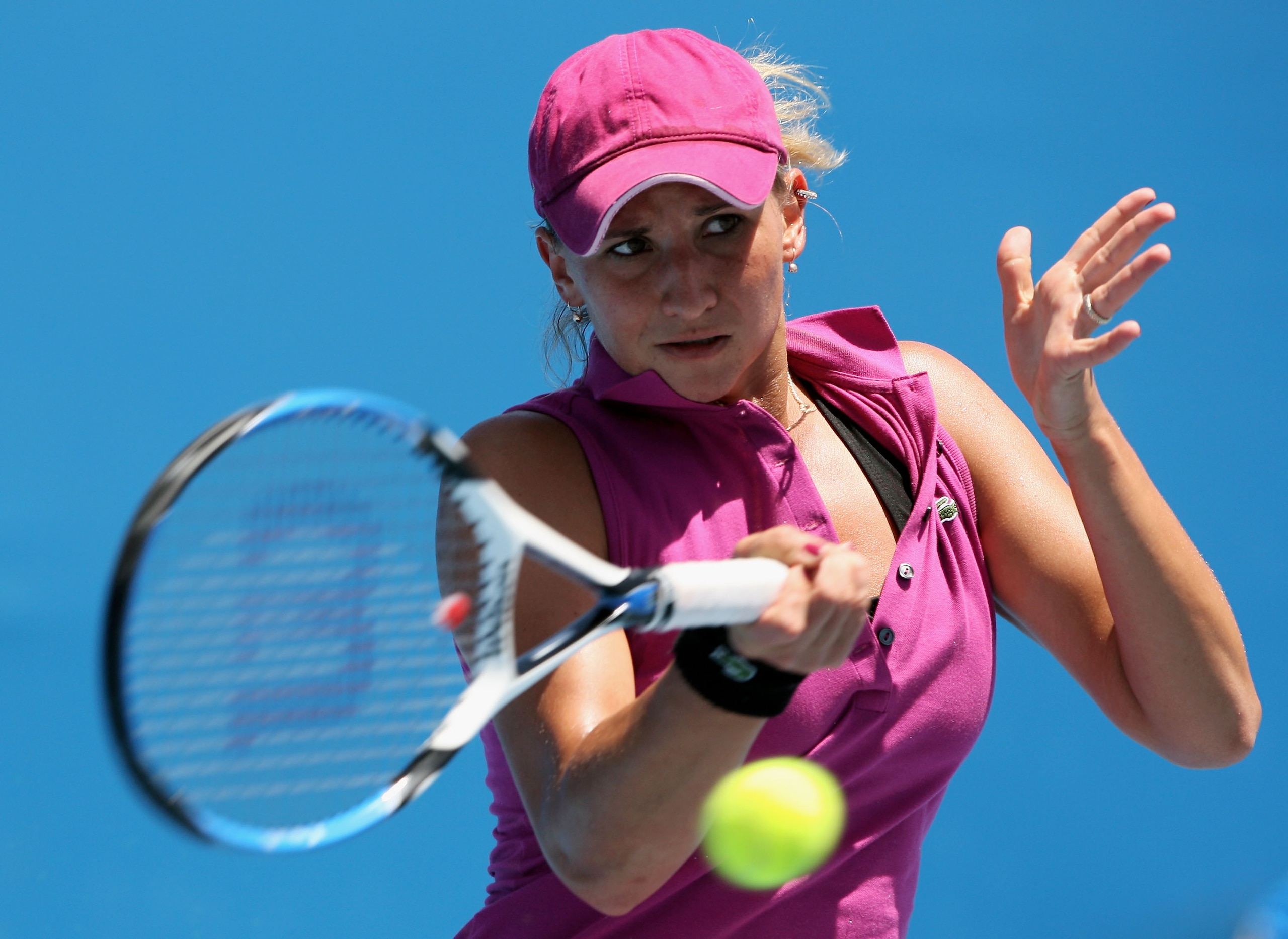 MELBOURNE, AUSTRALIA - JANUARY 14:  Tatiana Golovin of France plays a forehand during her first round match against Stephanie Cohen-Aloro of France on day one of the Australian Open 2008 at Melbourne Park on January 14, 2008 in Melbourne, Australia.  (Pho