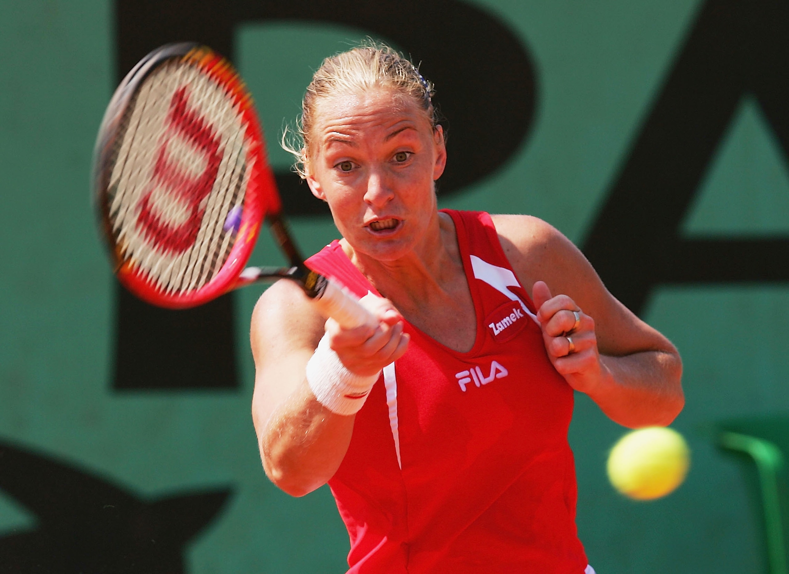 PARIS - MAY 25:  Barbara Rittner of Germany returns in her first round match against Barbara Schett of Austria during Day Two of the 2004 French Open Tennis Championship at Roland Garros, on May 25, 2004 in Paris, France.  (Photo by Clive Brunskill/Getty
