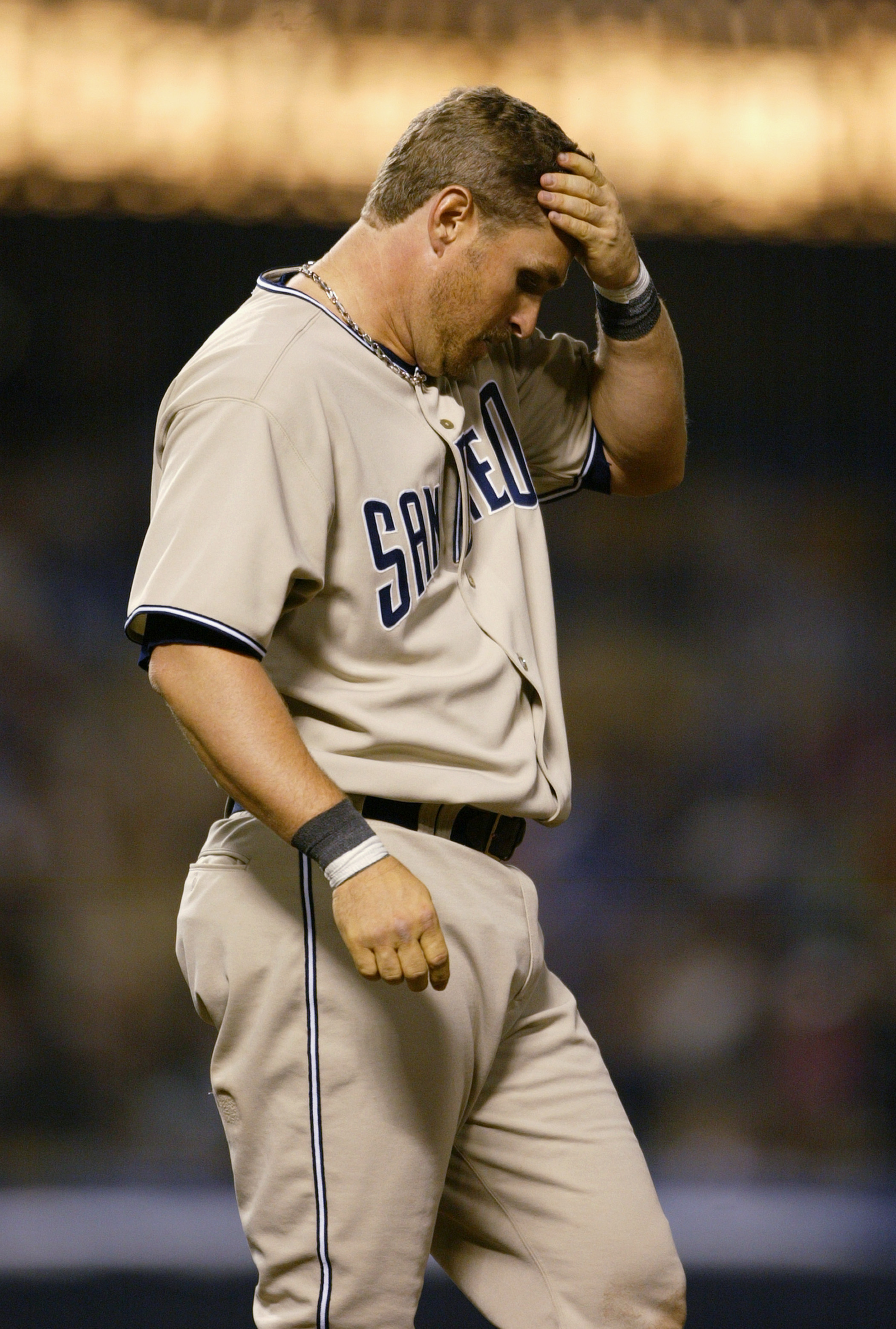 LOS ANGELES - APRIL 6:  First basemen Phil Nevin #23 of the San Diego Padres reacts during the game against the Los Angeles Dodgers on April 6, 2004 at Dodger Stadium in Los Angeles, California.  The Dodgers won 5-4. (Photo by Doug Benc/Getty Images)