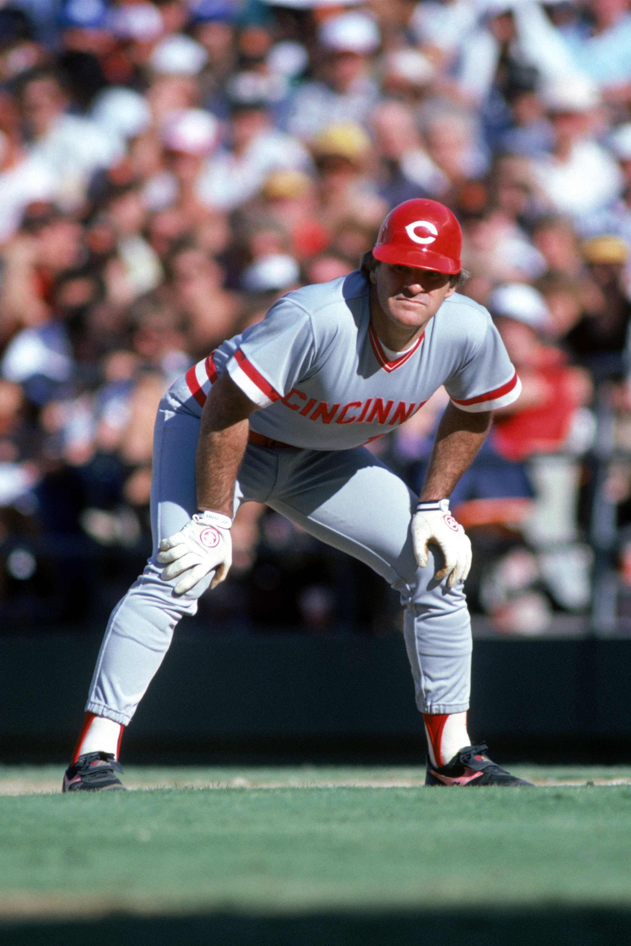 SAN DIEGO, CA - 1986:  Pete Rose #14 of the Cincinnati Reds readies for a play during a game against the San Diego Padres at Jack Murphy Stadium in the 1986 MLB season in San Diego, California.  (Photo by Stephen Dunn/Getty Images)