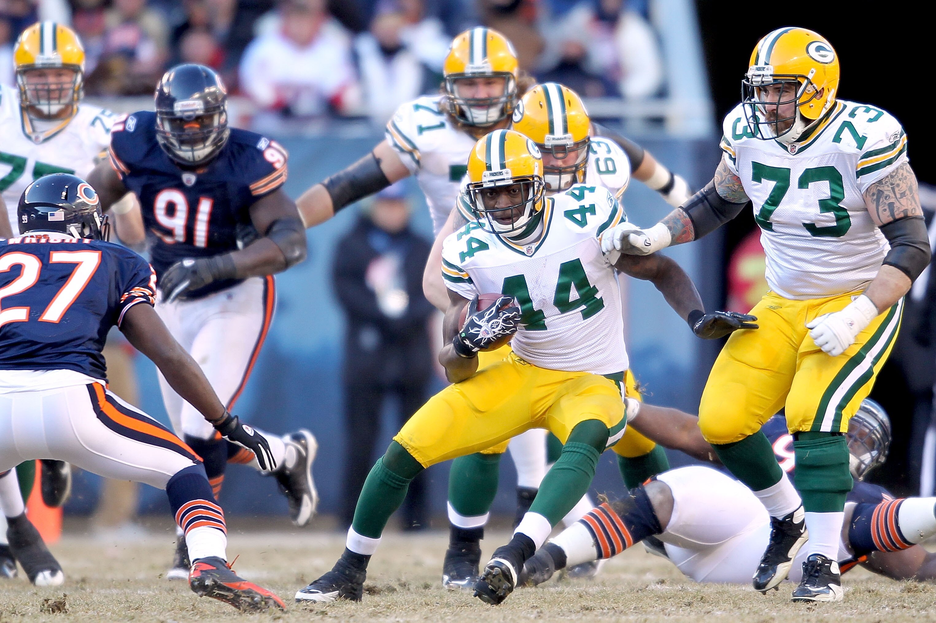 CHICAGO, IL - JANUARY 23:  Running back James Starks #44 of the Green Bay Packers runs the ball in the second quarter against the Chicago Bears in the NFC Championship Game at Soldier Field on January 23, 2011 in Chicago, Illinois.  (Photo by Andy Lyons/G