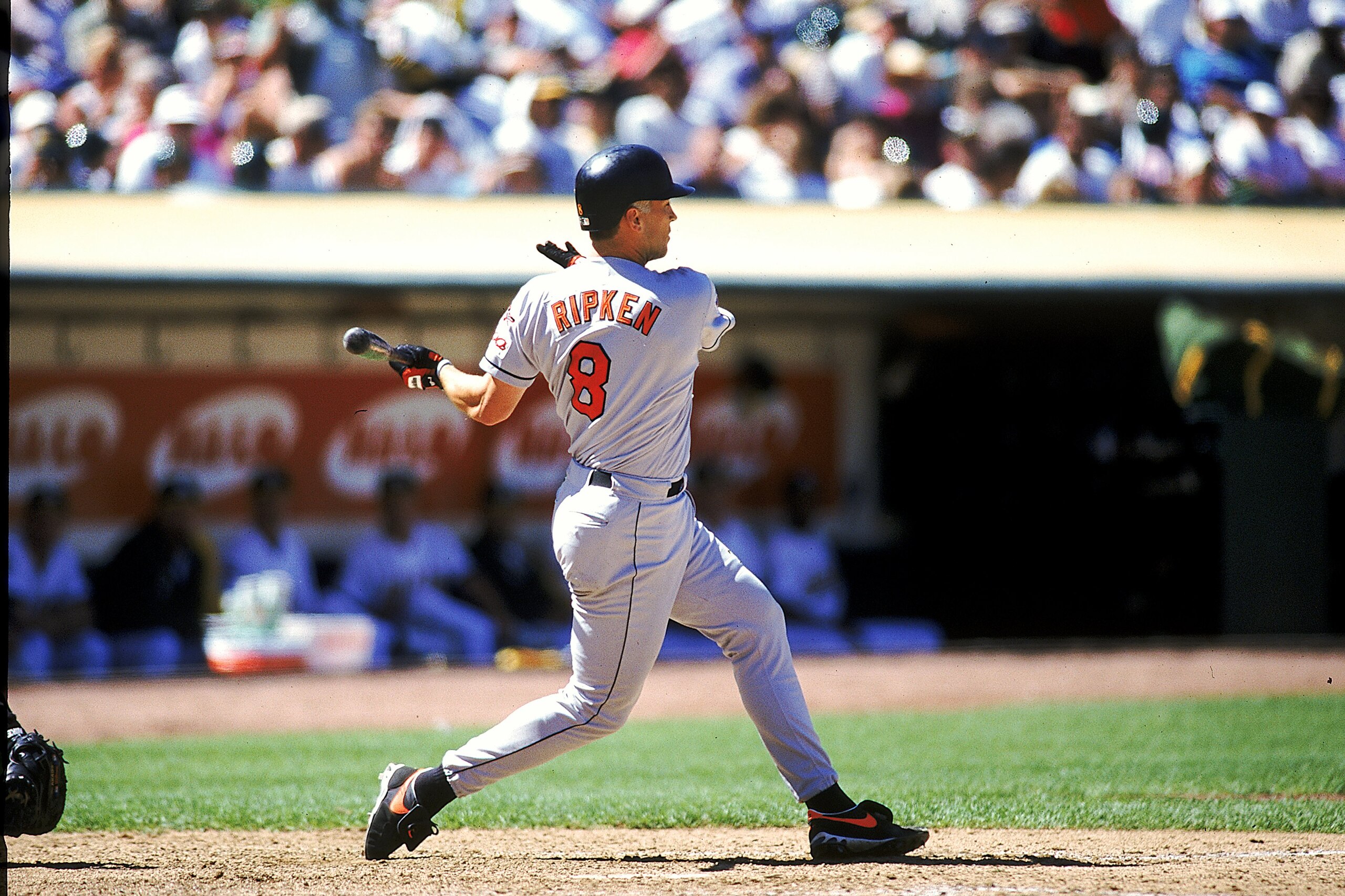 3 Aug 1997: Cal Ripken Jr.#8 of the Baltimore Orioles swings at the ball during a game against the Oakland Athletics at Oakland Coliseum in Oakland, California. The Orioles defeated the Athletics 7-5. Mandatory Credit: Otto Greule Jr.  /Allsport