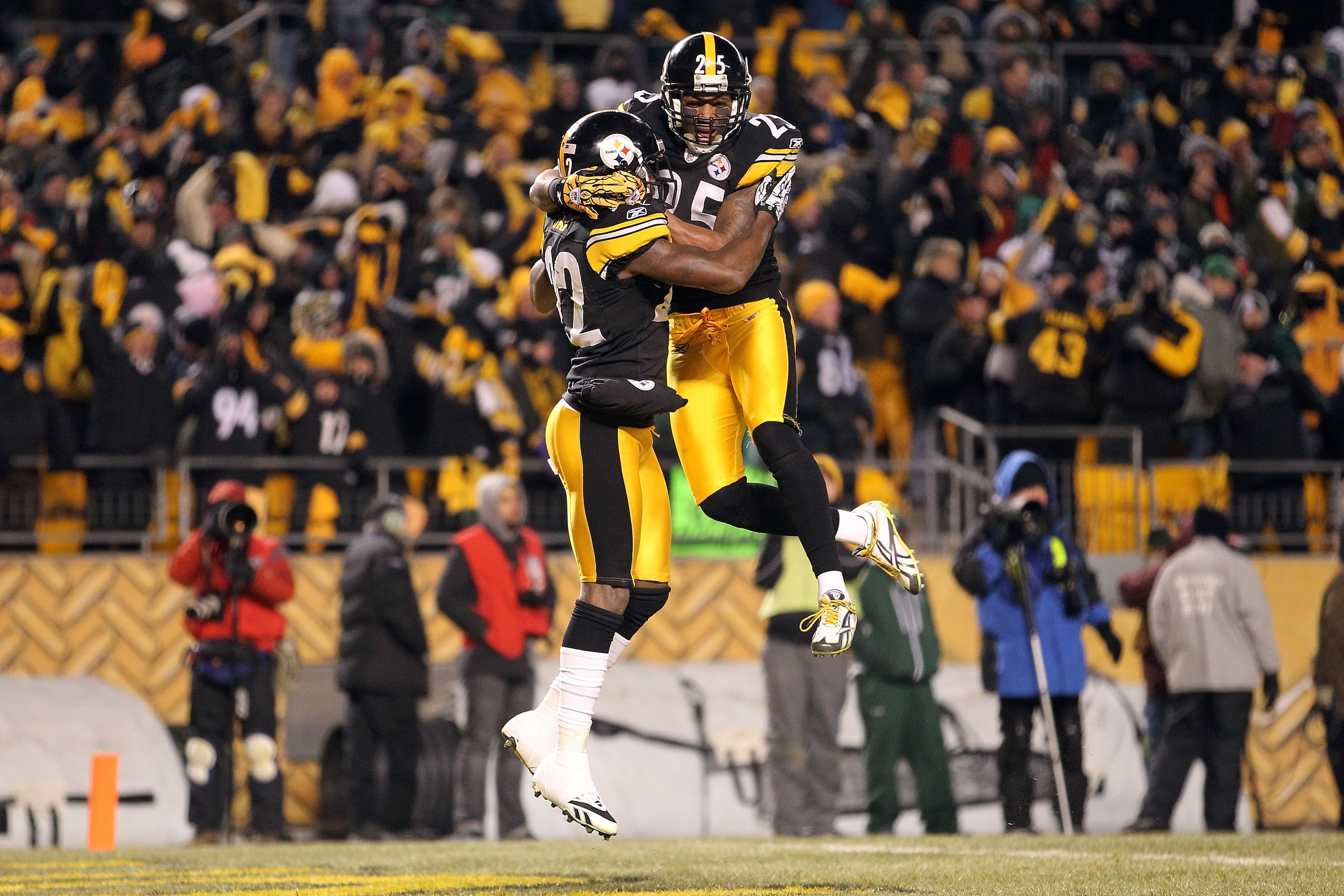 PITTSBURGH, PA - JANUARY 23:  William Gay #22 and Ryan Clark #25 of the Pittsburgh Steelers celebrate Gay's second quarter touchdown scored after Mark Sanchez #6 of the New York Jets fumbled during the 2011 AFC Championship game at Heinz Field on January