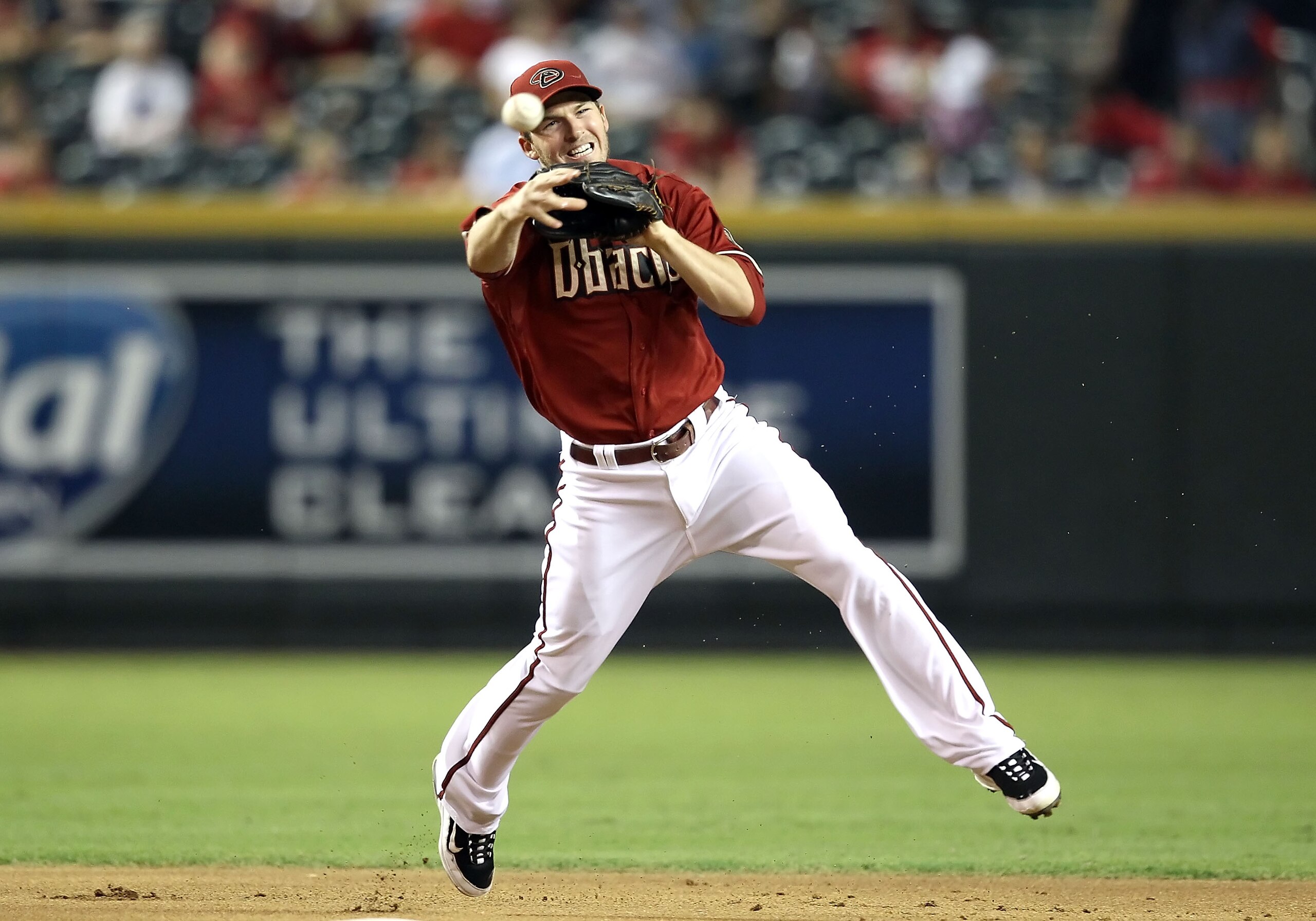 PHOENIX - SEPTEMBER 22:  Infielder Stephen Drew #6 of the Arizona Diamondbacks fields a ground ball out against the Colorado Rockies during the Major League Baseball game at Chase Field on September 22, 2010 in Phoenix, Arizona.  (Photo by Christian Peter