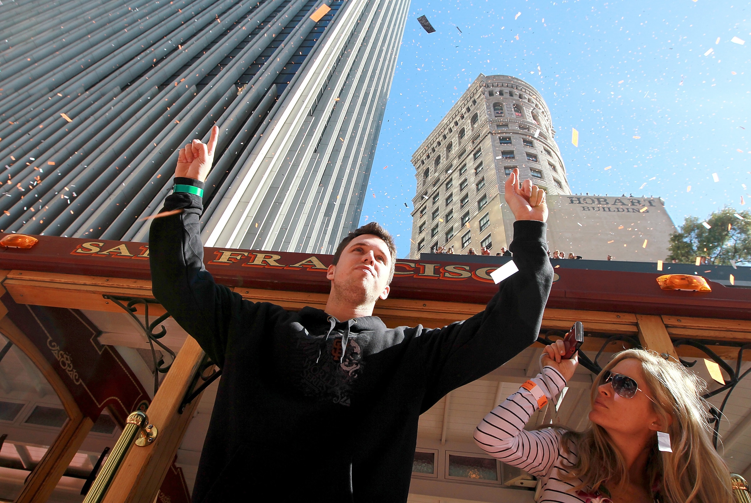 SAN FRANCISCO - NOVEMBER 03: Buster Posey of the San Francisco Giants celebrates during the Giants' vicotry parade on November 3, 2010 in San Francisco, California. Thousands of Giants fans lined the streets of San Francisco to watch the San Francisco Gi SAN FRANCISCO - NOVEMBER 03: Buster Posey of the San Francisco Giants celebrates during the Giants' vicotry parade on November 3, 2010 in San Francisco, California. Thousands of Giants fans lined the streets of San Francisco to watch the San Francisco Gi
