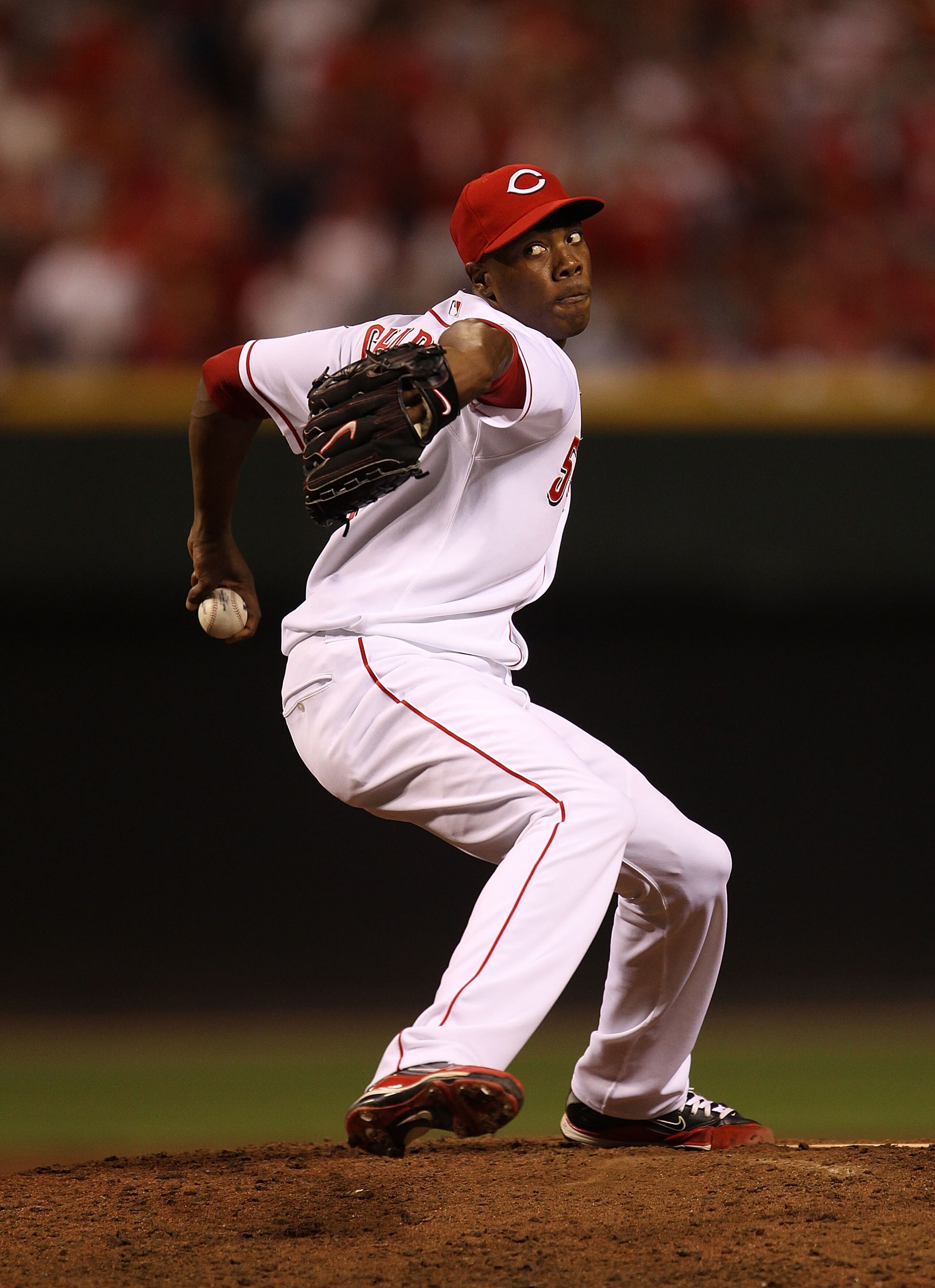 CINCINNATI - OCTOBER 10: Aroldis Chapman #54 of the Cincinnati Reds pitches in the 9th inning against the Philadelphia Phillies during game 3 of the NLDS at Great American Ball Park on October 10, 2010 in Cincinnati, Ohio. The Phillies defeated the Reds 2