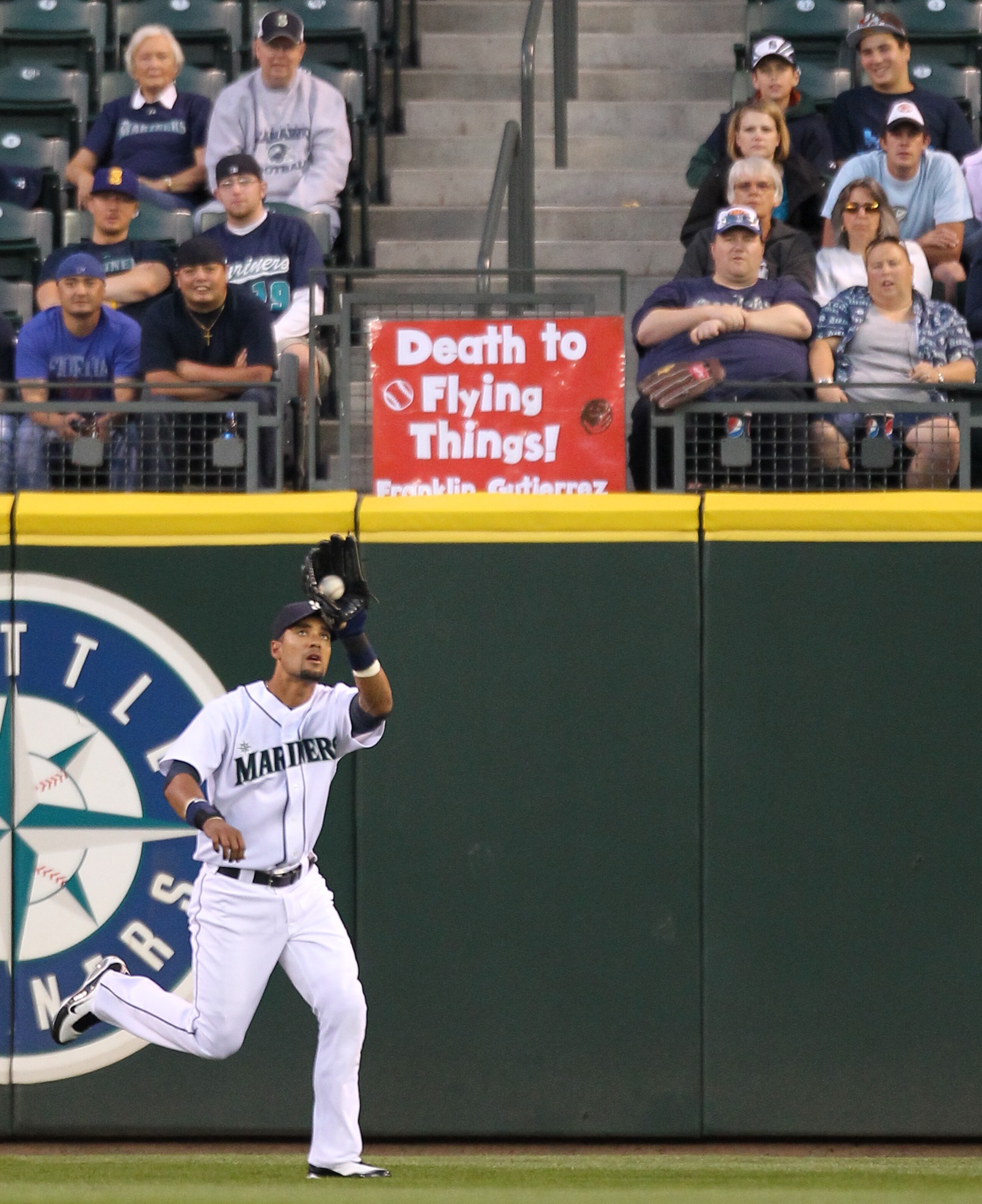 SEATTLE - AUGUST 03: Center fielder Franklin Gutierrez #21 of the Seattle Mariners makes a catch against the Texas Rangers at Safeco Field on August 3, 2010 in Seattle, Washington. (Photo by Otto Greule Jr/Getty Images) SEATTLE - AUGUST 03: Center fielder Franklin Gutierrez #21 of the Seattle Mariners makes a catch against the Texas Rangers at Safeco Field on August 3, 2010 in Seattle, Washington. (Photo by Otto Greule Jr/Getty Images)