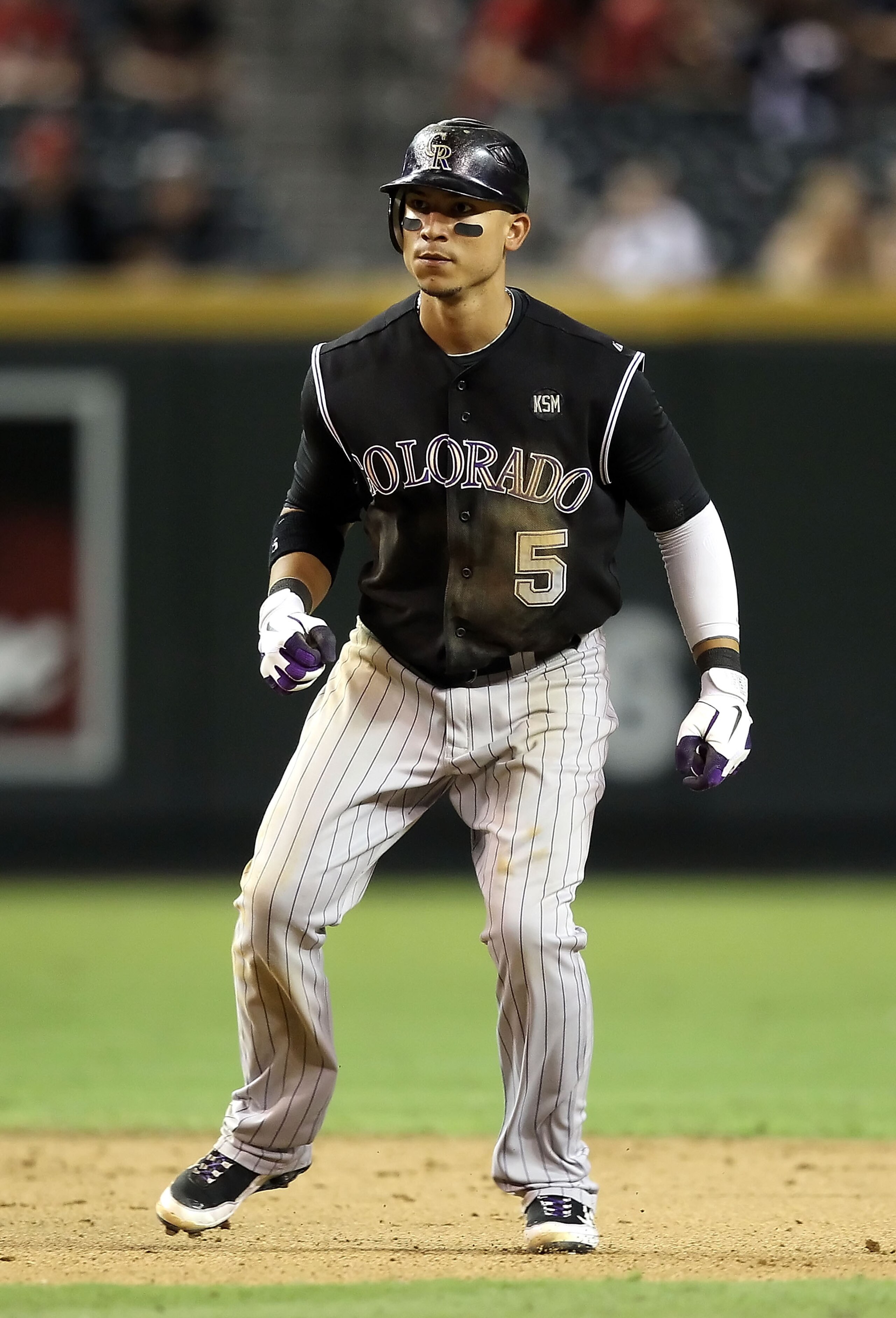 PHOENIX - SEPTEMBER 22: Carlos Gonzalez #5 of the Colorado Rockies leads off second base during the Major League Baseball game against the Arizona Diamondbacks at Chase Field on September 22, 2010 in Phoenix, Arizona. (Photo by Christian Petersen/Getty PHOENIX - SEPTEMBER 22: Carlos Gonzalez #5 of the Colorado Rockies leads off second base during the Major League Baseball game against the Arizona Diamondbacks at Chase Field on September 22, 2010 in Phoenix, Arizona. (Photo by Christian Petersen/Getty