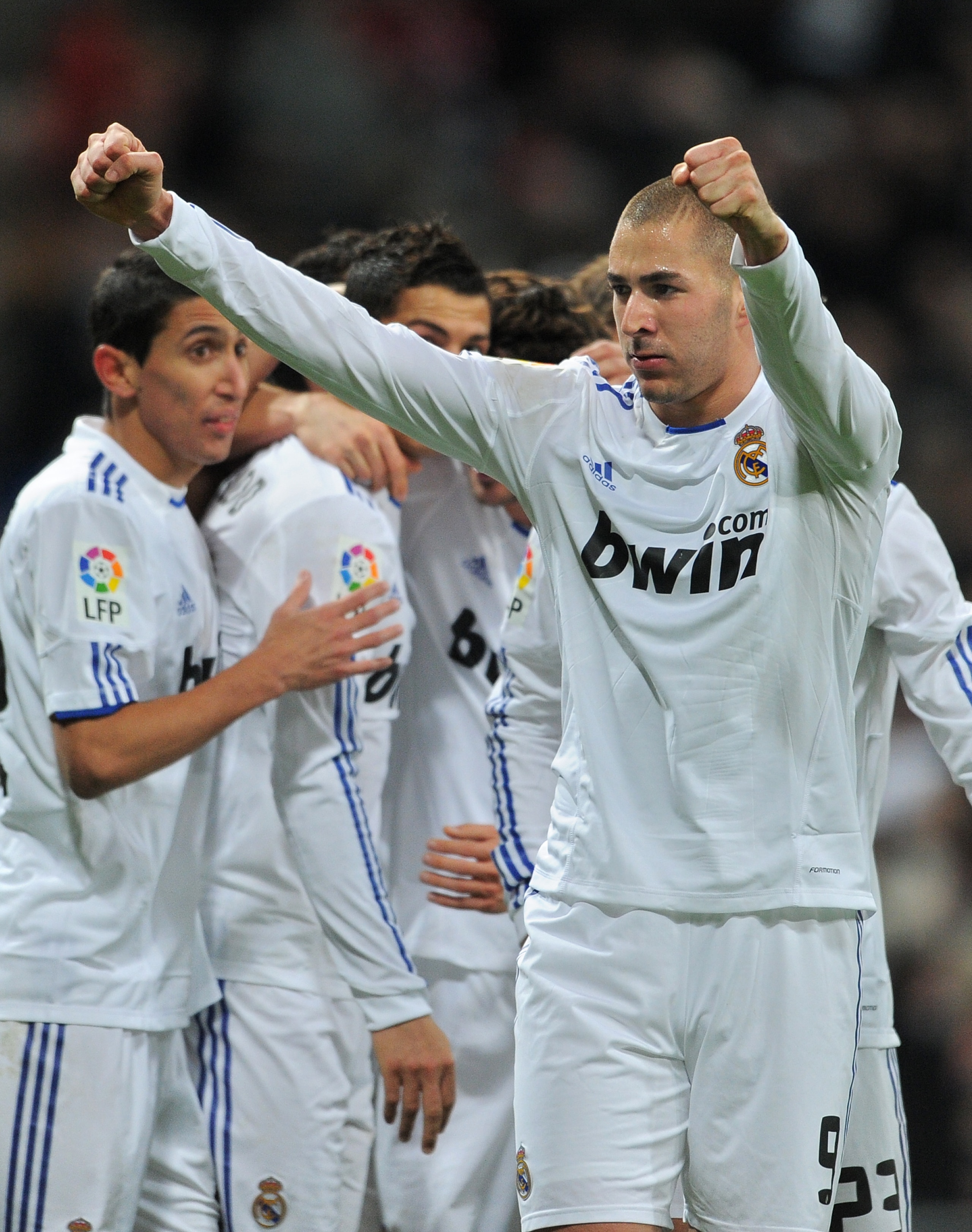 MADRID, SPAIN - JANUARY 23:  Karim Benzema of Real Madrid celebrates scoring his sides opening goal during the la liga match between Real Madrid and Mallorca at Estadio Santiago Bernabeu on January  23, 2011 in Madrid, Spain.  (Photo by Jasper Juinen/Gett