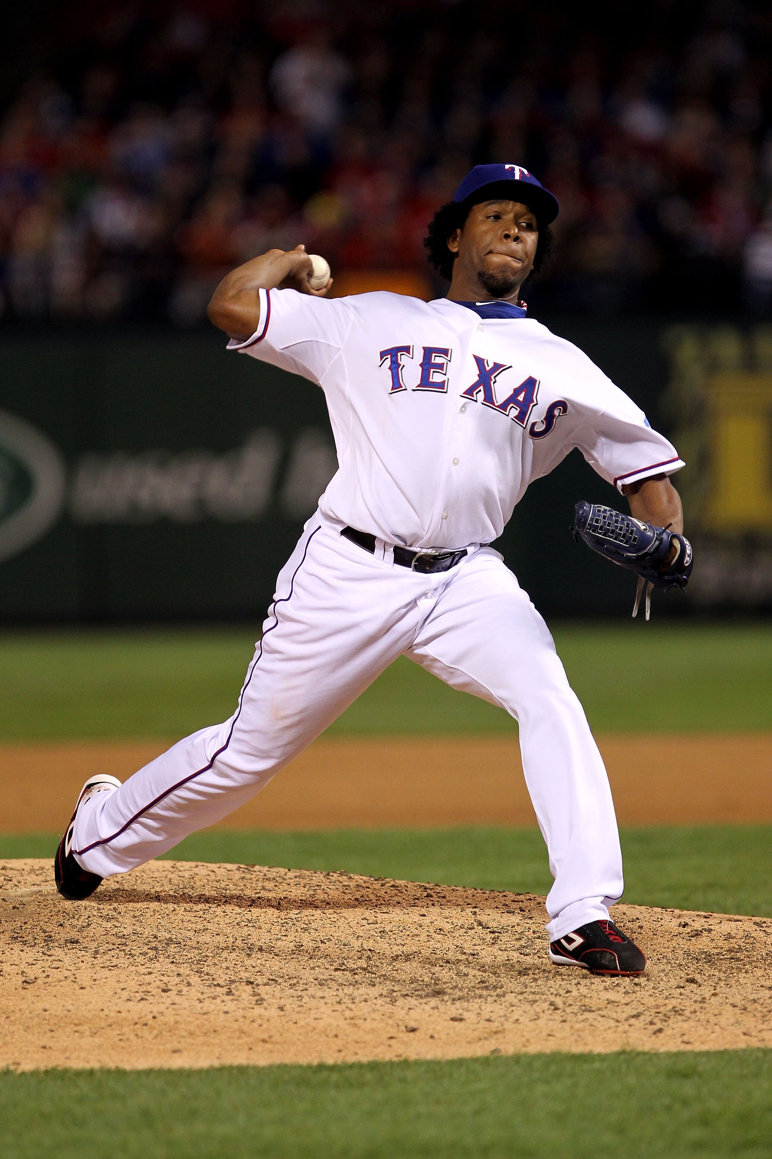 ARLINGTON, TX - NOVEMBER 01: Neftali Feliz #30 of the Texas Rangers pitches against the San Francisco Giants in Game Five of the 2010 MLB World Series at Rangers Ballpark in Arlington on November 1, 2010 in Arlington, Texas. The Giants won 3-1. (Photo b ARLINGTON, TX - NOVEMBER 01: Neftali Feliz #30 of the Texas Rangers pitches against the San Francisco Giants in Game Five of the 2010 MLB World Series at Rangers Ballpark in Arlington on November 1, 2010 in Arlington, Texas. The Giants won 3-1. (Photo b