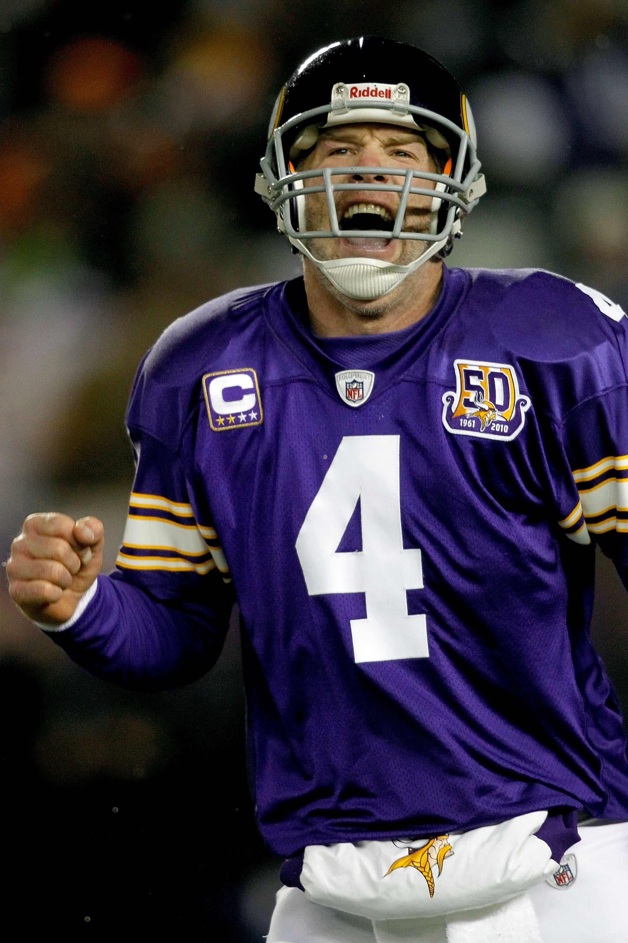 MINNEAPOLIS, MN - DECEMBER 20:  Quarterback Brett Favre of the Minnesota Vikings celebrates the Vikings first touchdown against the Chicago Bears at TCF Bank Stadium on December 20, 2010 in Minneapolis, Minnesota.  (Photo by Matthew Stockman/Getty Images)