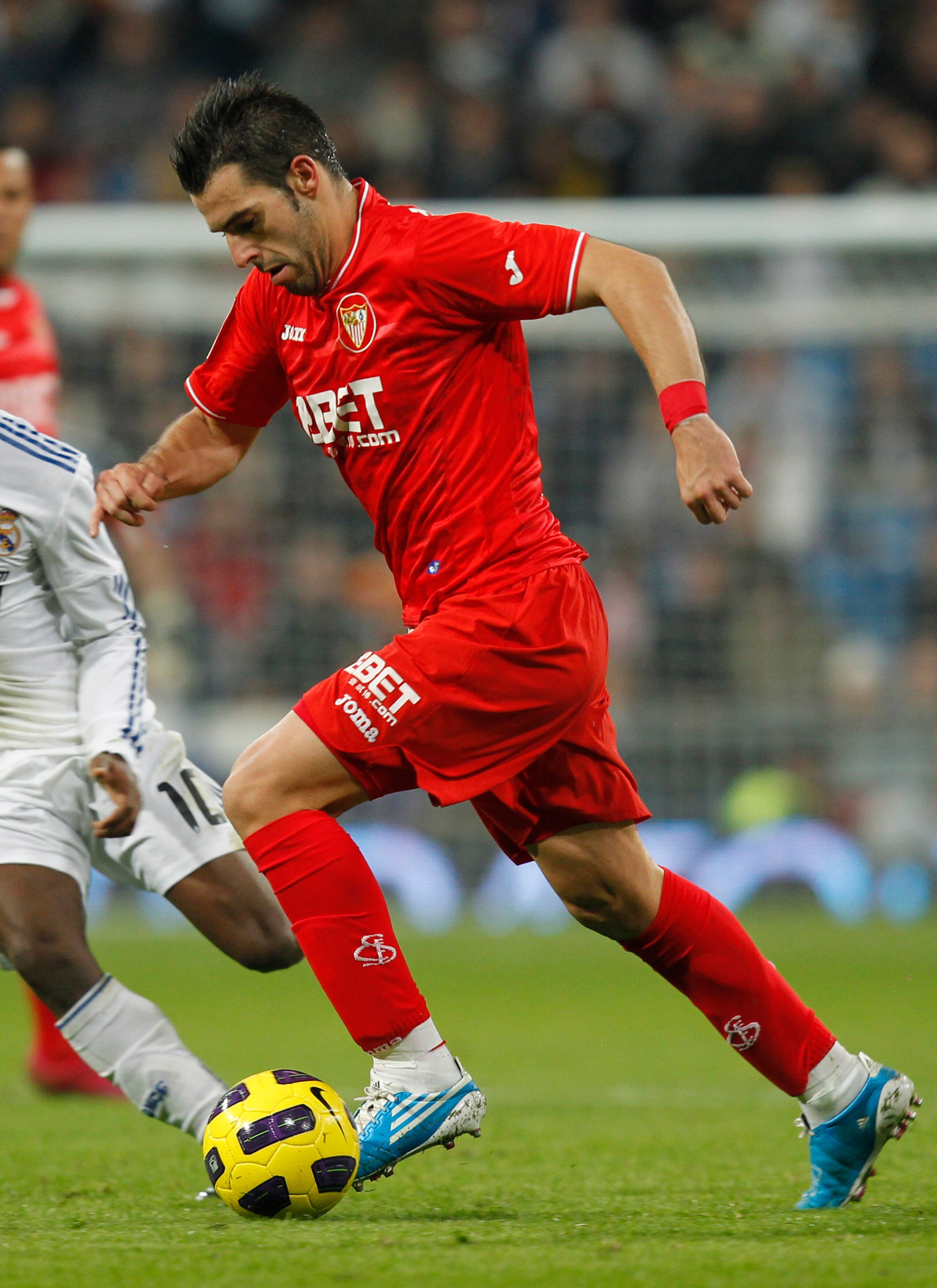 MADRID, SPAIN - DECEMBER 19: Alvaro Negredo of Sevilla in action during the La Liga match between Real Madrid and Sevilla at Estadio Santiago Bernabeu on December 19, 2010 in Madrid, Spain. Real Madrid won the match 1-0. (Photo by Angel Martinez/Getty I MADRID, SPAIN - DECEMBER 19: Alvaro Negredo of Sevilla in action during the La Liga match between Real Madrid and Sevilla at Estadio Santiago Bernabeu on December 19, 2010 in Madrid, Spain. Real Madrid won the match 1-0. (Photo by Angel Martinez/Getty I