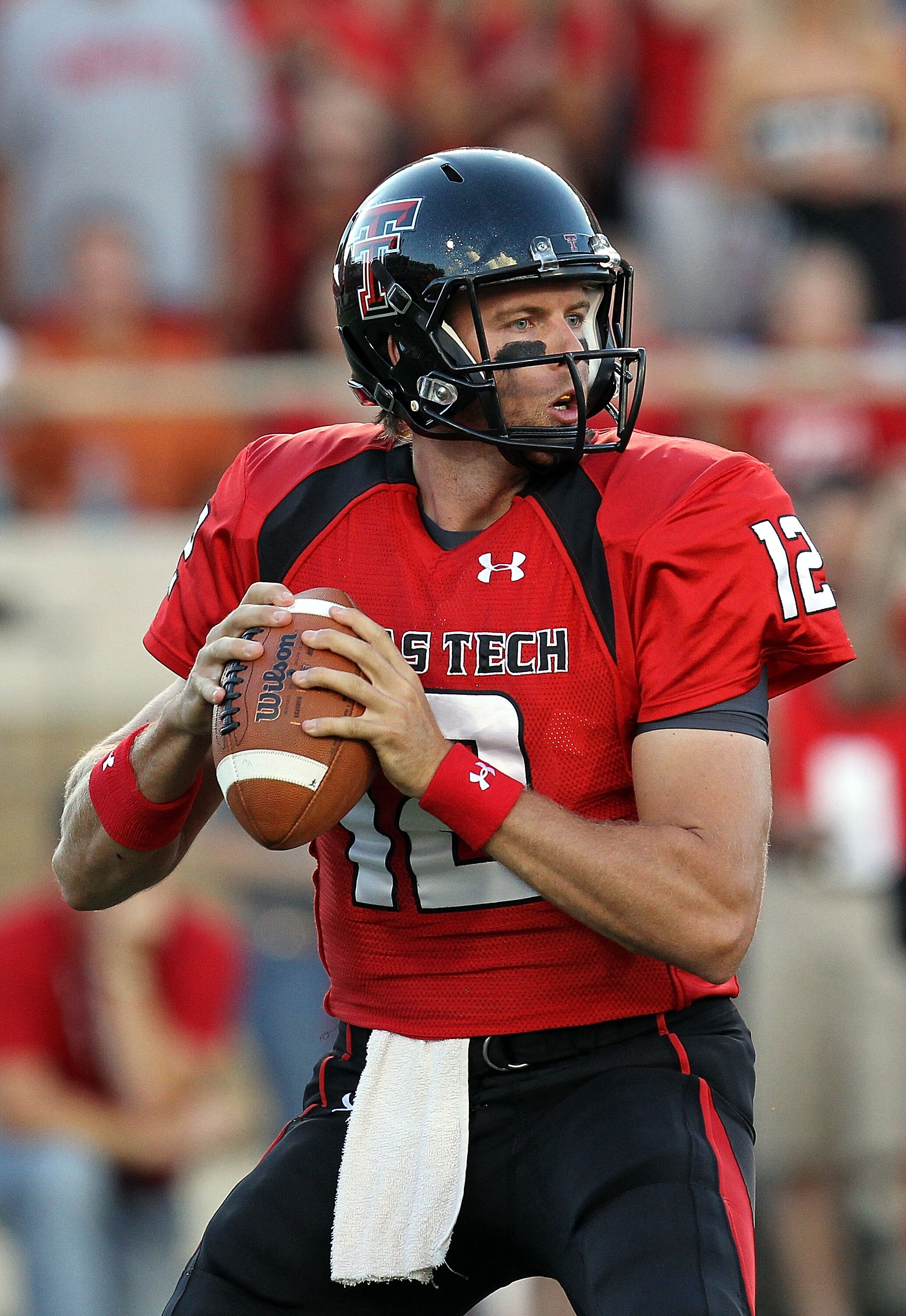 LUBBOCK, TX - SEPTEMBER 18:  Quarterback Taylor Potts #12 of the Texas Tech Red Raiders against the Texas Longhorns at Jones AT&T Stadium on September 18, 2010 in Lubbock, Texas.  (Photo by Ronald Martinez/Getty Images)