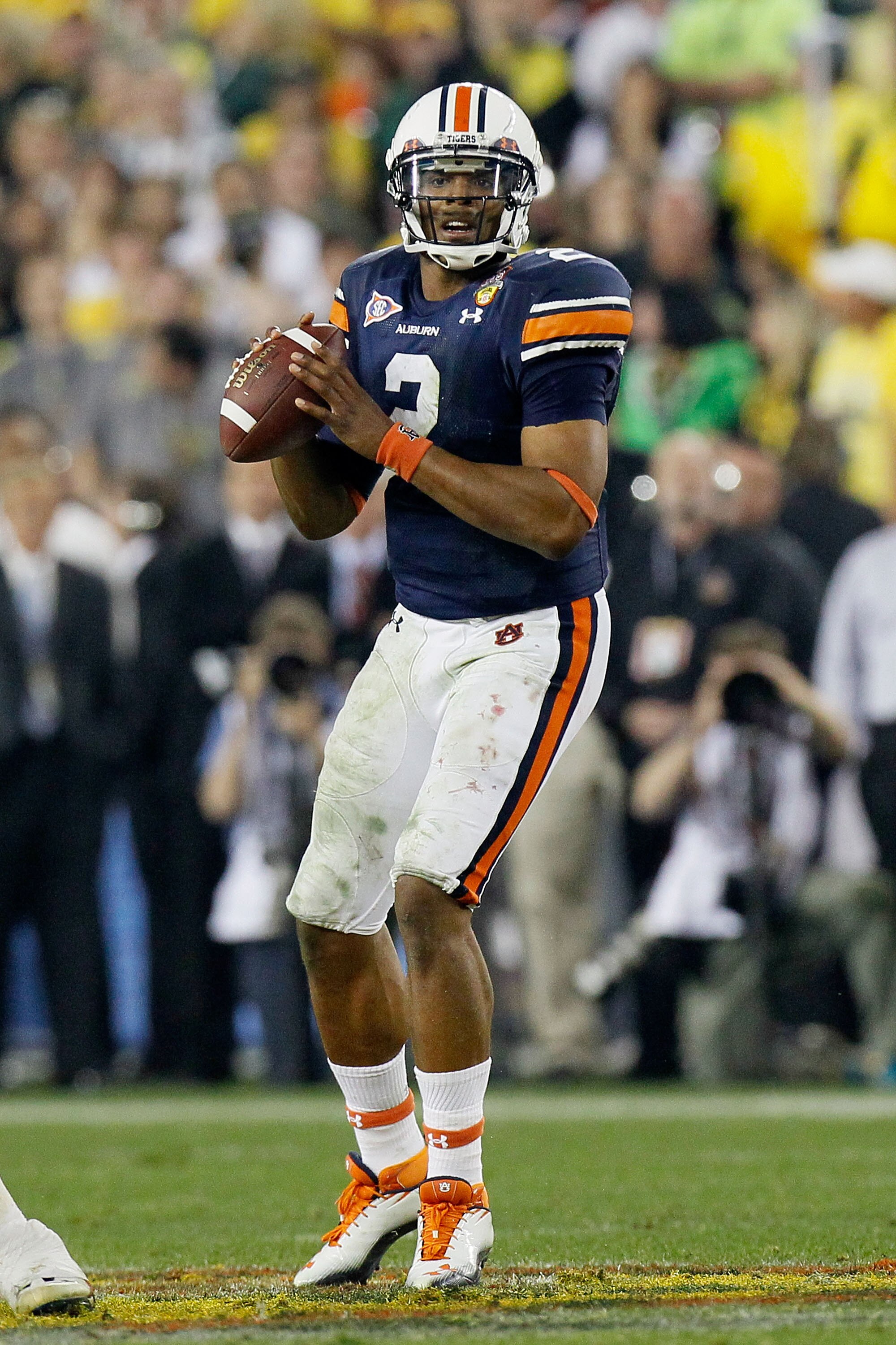 GLENDALE, AZ - JANUARY 10:  Cameron Newton #2 of the Auburn Tigers scrambles against the Oregon Ducks during the Tostitos BCS National Championship Game at University of Phoenix Stadium on January 10, 2011 in Glendale, Arizona.  (Photo by Kevin C. Cox/Get