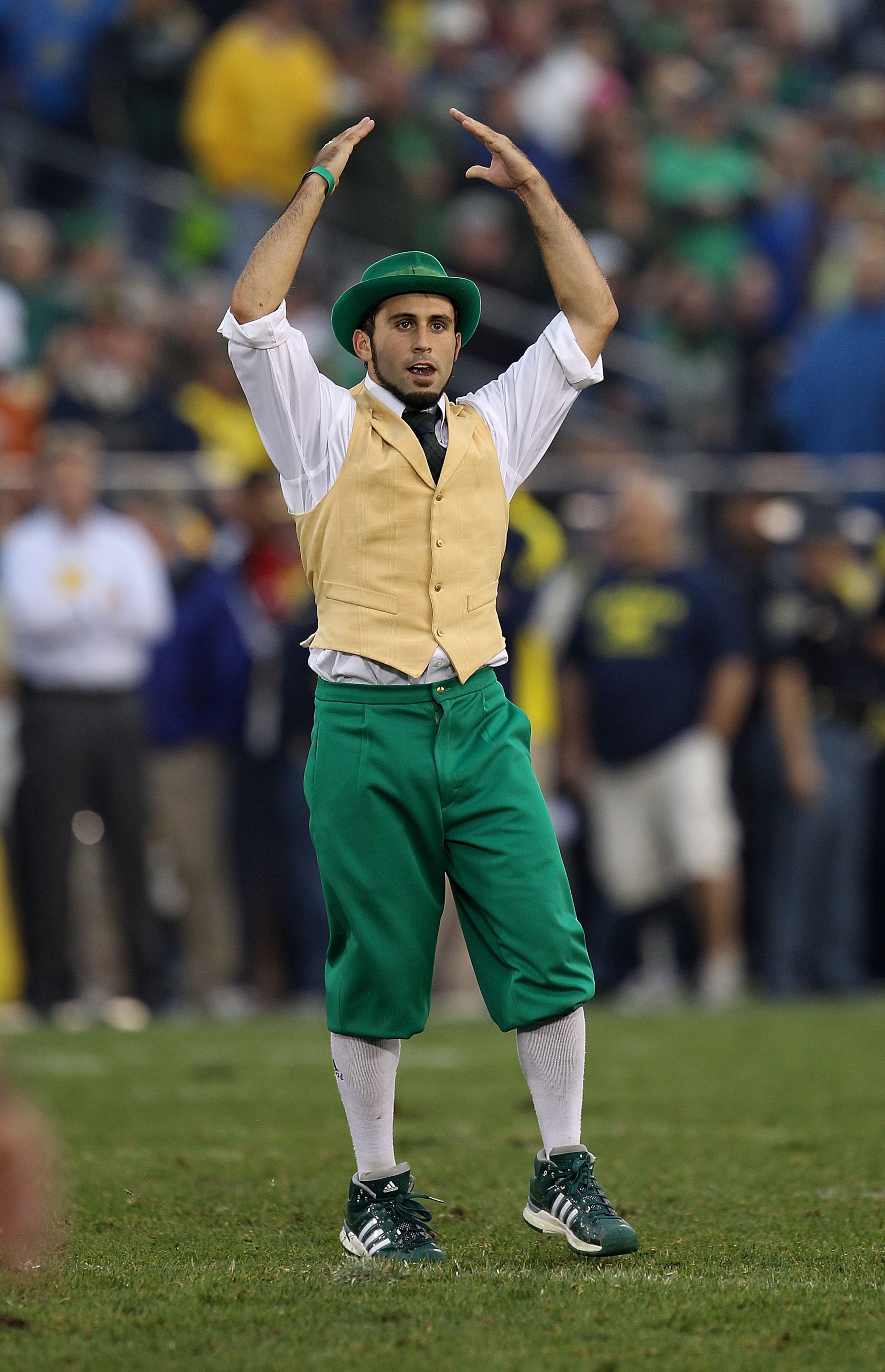 SOUTH BEND, IN - SEPTEMBER 11: The leprechaun mascot for the Notre Dame Fighting Irish performs during a game against the Michigan Wolverines at Notre Dame Stadium on September 11, 2010 in South Bend, Indiana. Michigan defeated Notre Dame 28-24.  (Photo b