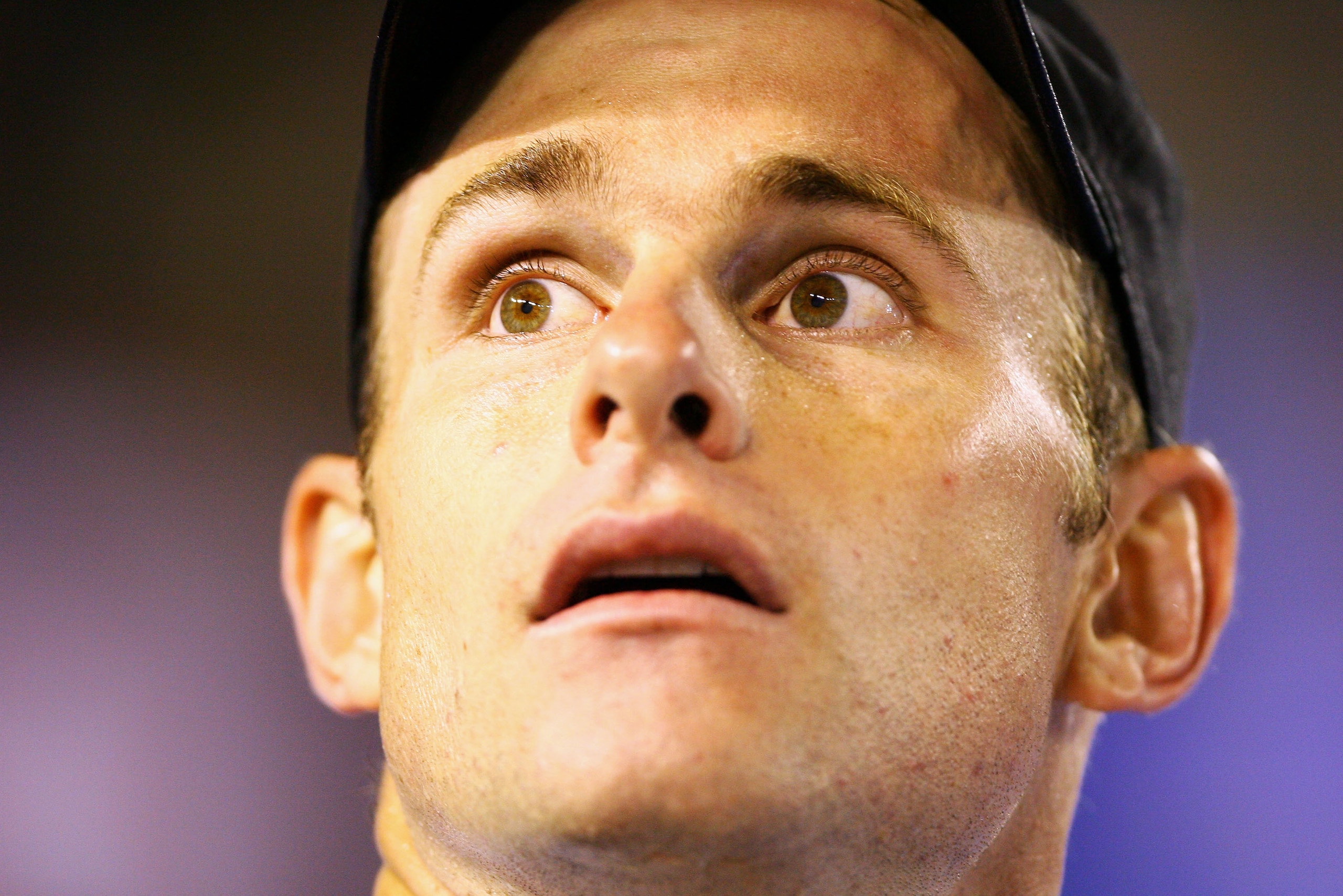 MELBOURNE, AUSTRALIA - JANUARY 23:  Andy Roddick of the United States of America reacts after a shot in his fourth round match against Stanislas Wawrinka of Switzerland during day seven of the 2011 Australian Open at Melbourne Park on January 23, 2011 in