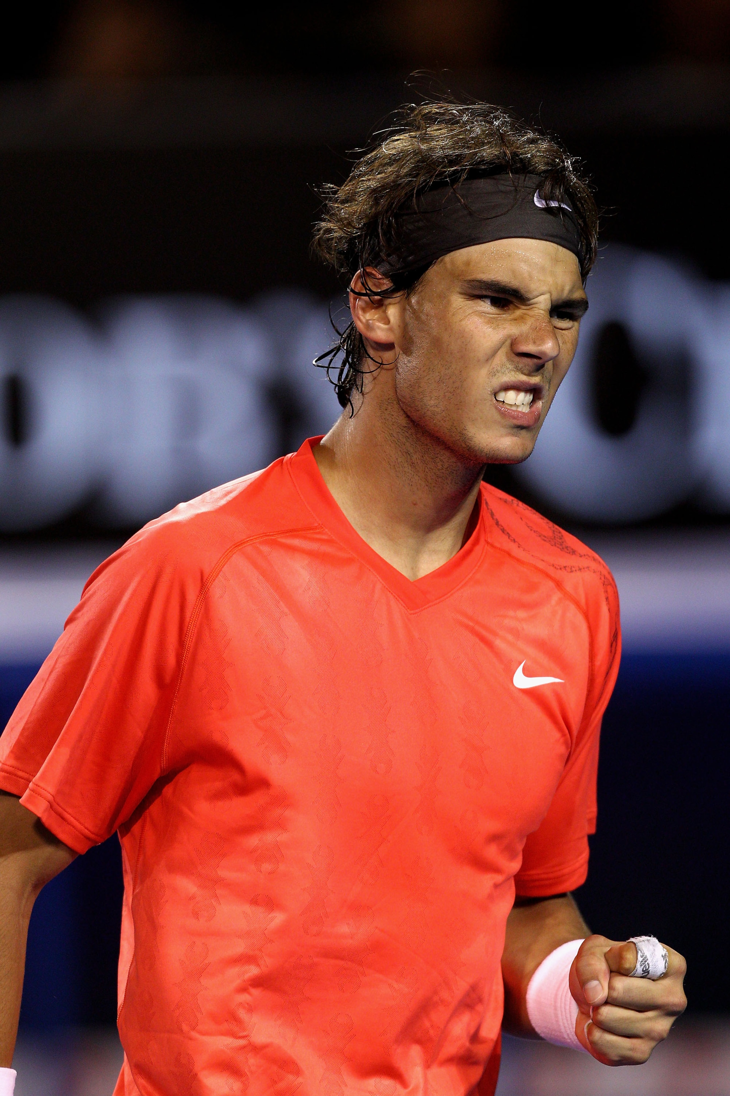 MELBOURNE, AUSTRALIA - JANUARY 24:  Rafael Nadal of Spain reacts during his fourth round match against Marin Cilic of Croatia during day eight of the 2011 Australian Open at Melbourne Park on January 24, 2011 in Melbourne, Australia.  (Photo by Ryan Piers