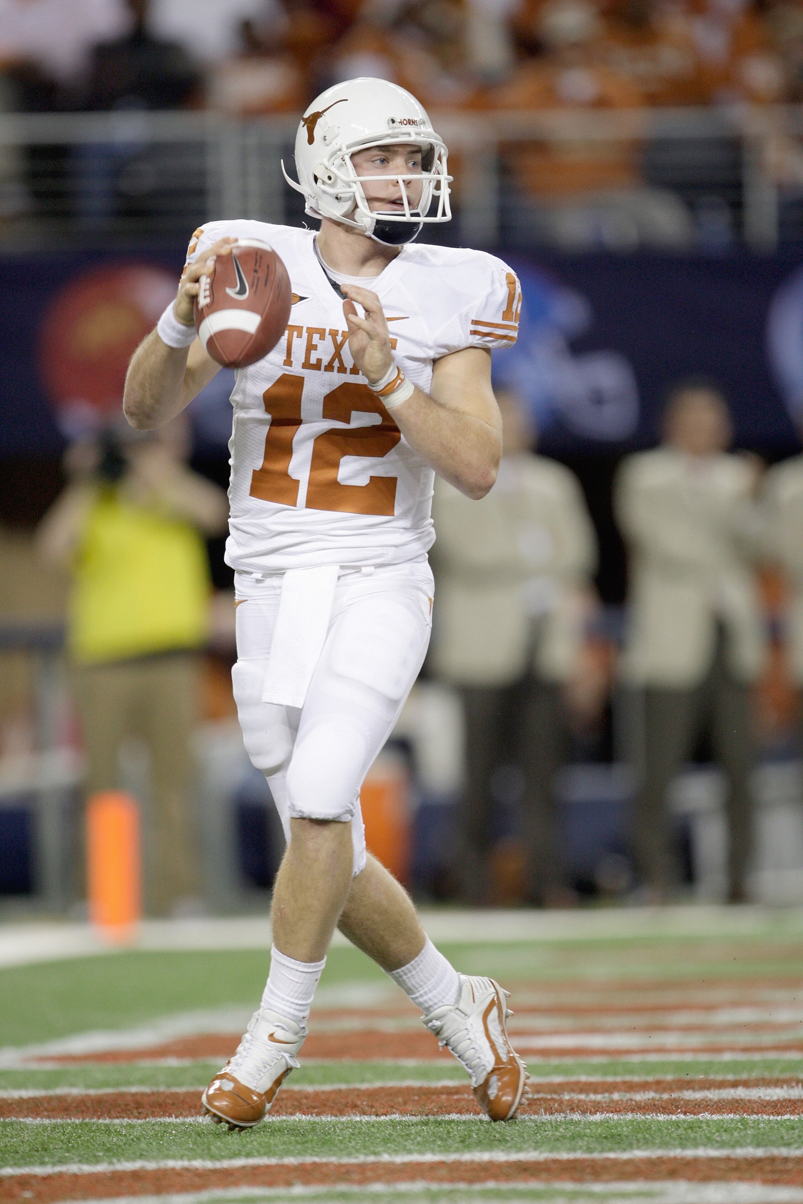 ARLINGTON, TX - DECEMBER 5: Colt McCoy #12 of the Texas Longhorns looks to pass the ball during the Big 12 Football Championship game against the Nebraska Cornhuskers at Cowboys Stadium on December 5, 2009 in Arlington, Texas. (Photo by Jamie Squire/Getty ARLINGTON, TX - DECEMBER 5: Colt McCoy #12 of the Texas Longhorns looks to pass the ball during the Big 12 Football Championship game against the Nebraska Cornhuskers at Cowboys Stadium on December 5, 2009 in Arlington, Texas. (Photo by Jamie Squire/Getty