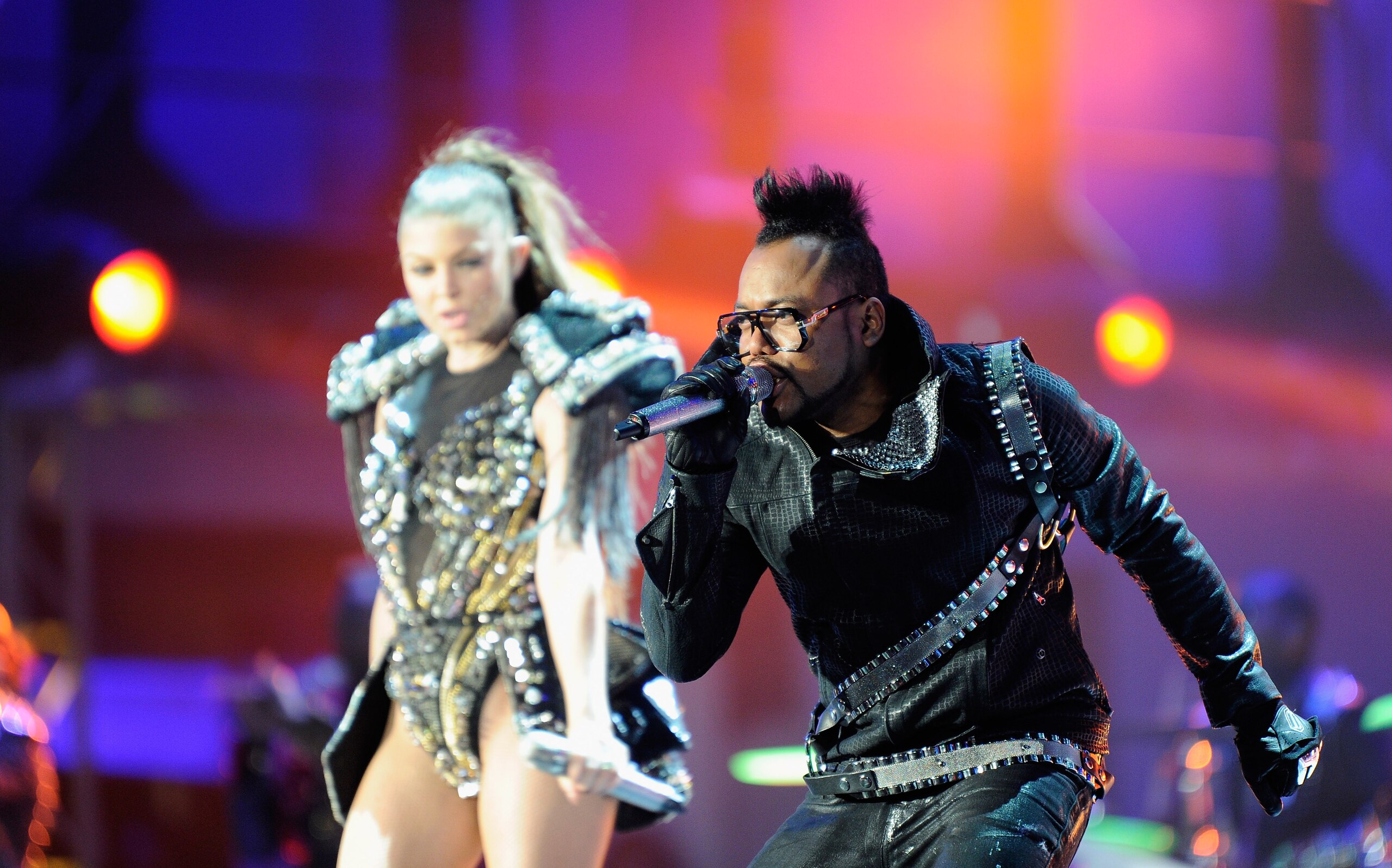 JOHANNESBURG, SOUTH AFRICA - JUNE 10:  Taboo and Fergie of the Black eyed peas performs a song during the kick-off celebration concert for the 2010 FIFA World Cup at the Orlando Stadium on June 10, 2010 in Soweto, South Africa.  (Photo by Stuart Franklin/