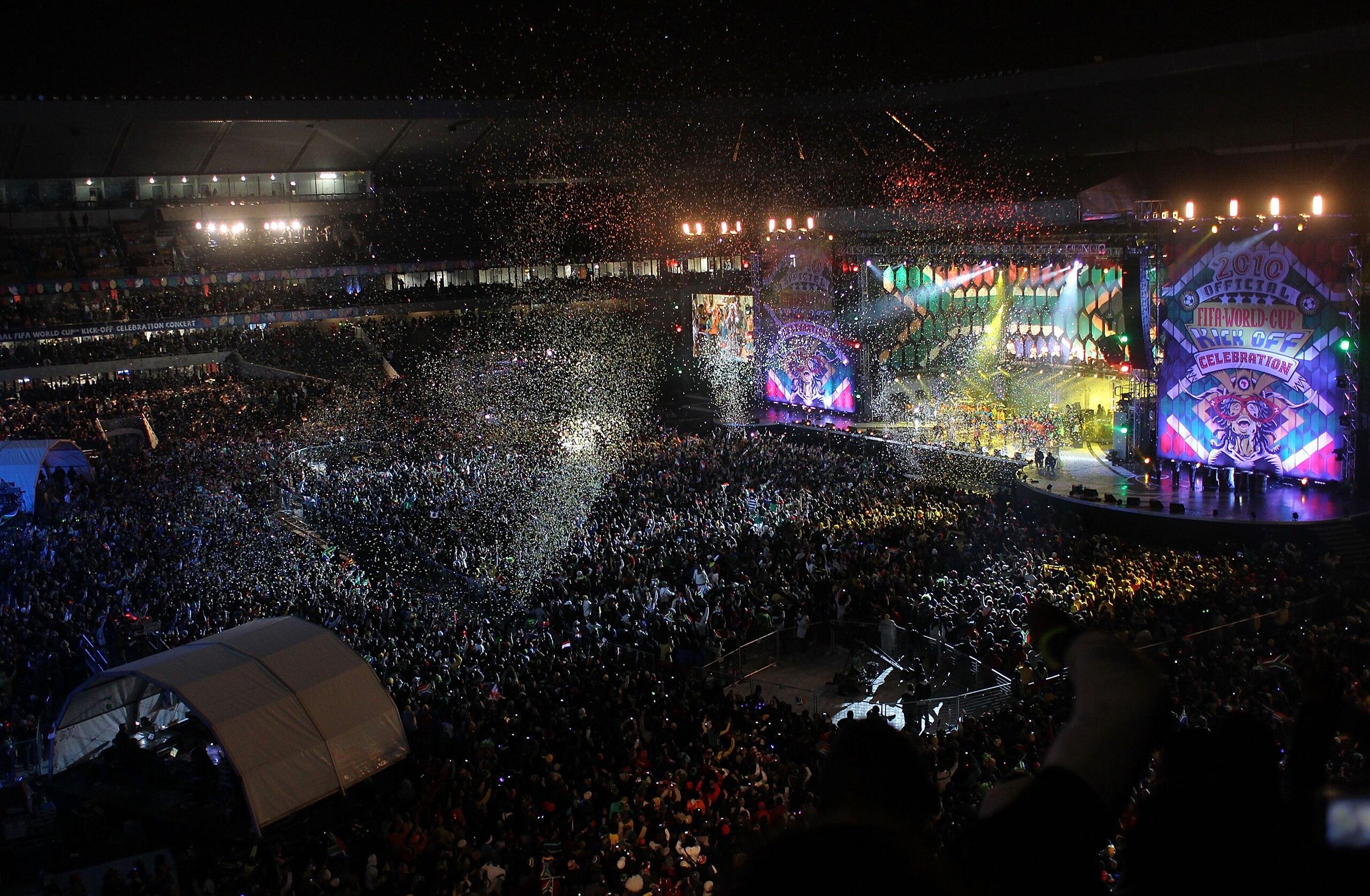 JOHANNESBURG, SOUTH AFRICA - JUNE 10: Confetti falls over the crowd as Shakira performs at the World Cup Launch Concert at the Orlando Stadium in Soweto on June 10, 2010 in Johannesburg, South Africa. Tens of thousands of people came out to see Shakira, A