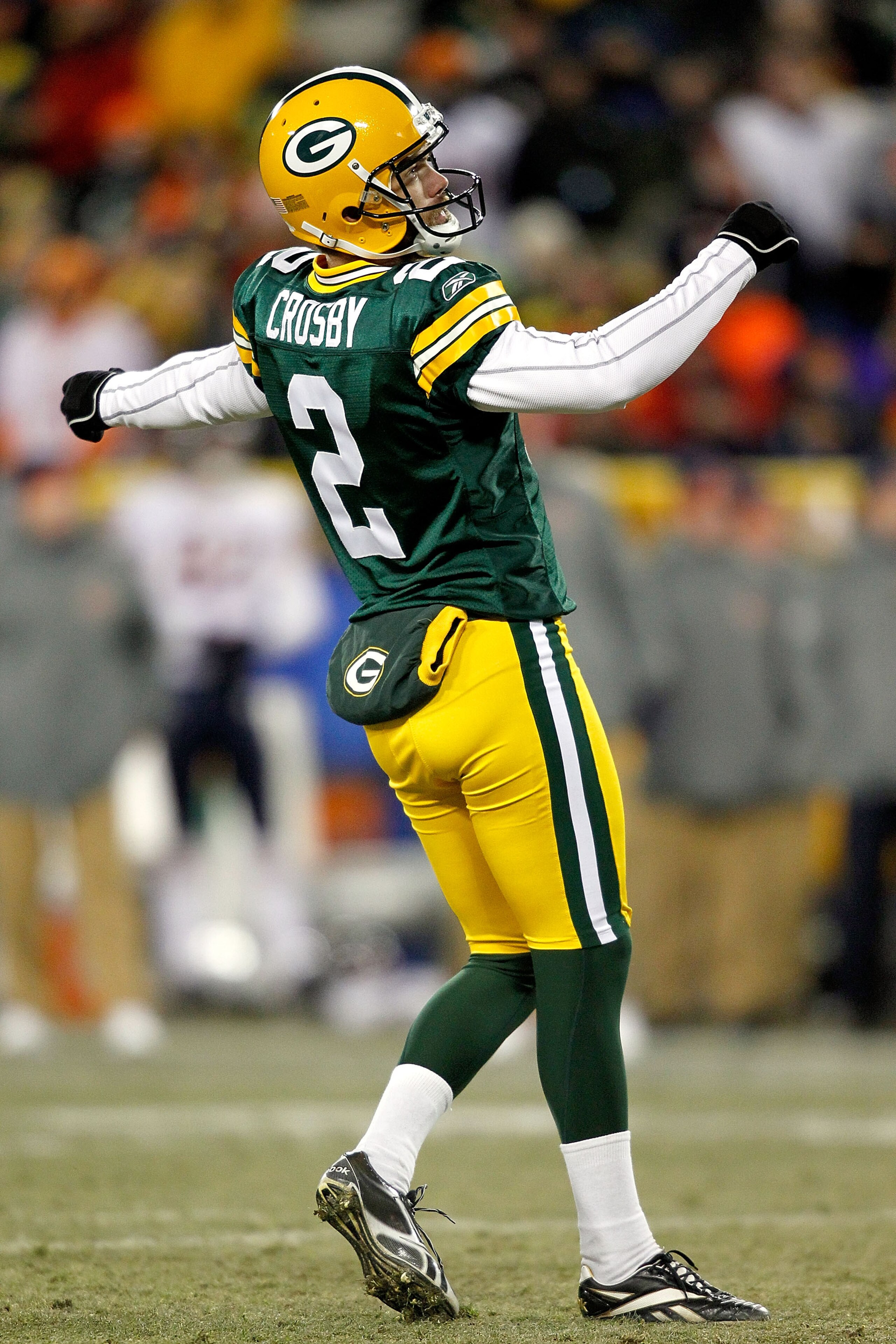 GREEN BAY, WI - JANUARY 02:  Mason Crosby #2 of the Green Bay Packers kicks a field goal against the Chicago Bears at Lambeau Field on January 2, 2011 in Green Bay, Wisconsin.  (Photo by Matthew Stockman/Getty Images)