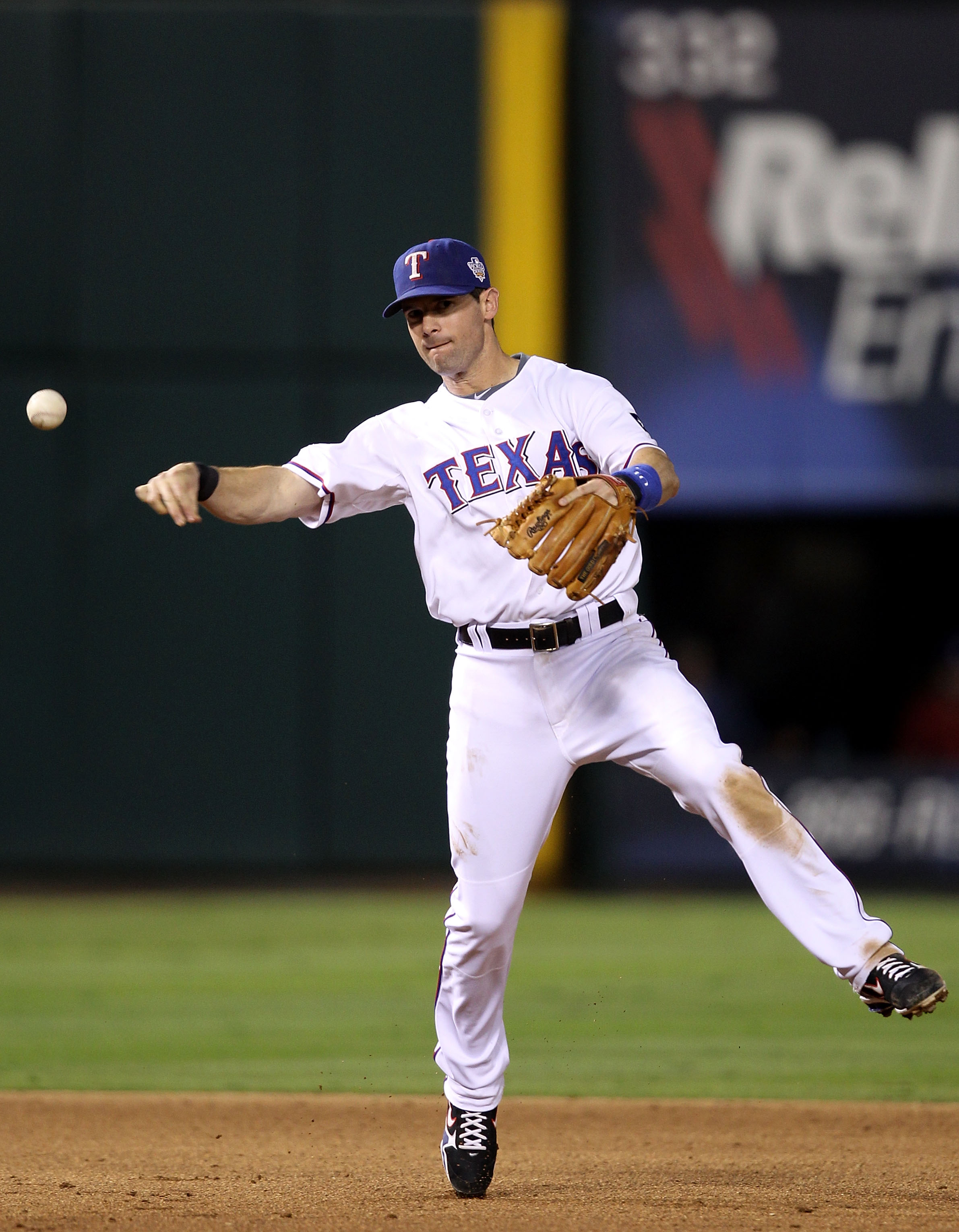 ARLINGTON, TX - OCTOBER 31:  Michael Young #10 of the Texas Rangers throws to first for the out against the San Francisco Giants in Game Four of the 2010 MLB World Series at Rangers Ballpark in Arlington on October 31, 2010 in Arlington, Texas.  (Photo by