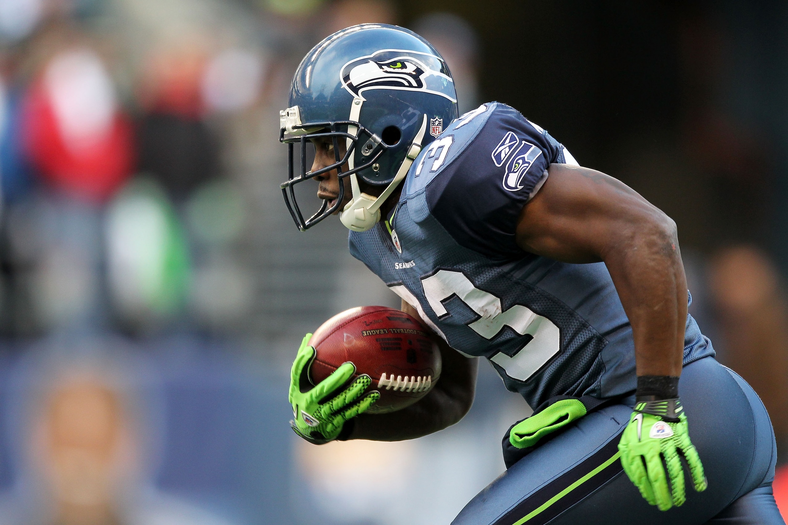 SEATTLE, WA - JANUARY 08: Leon Washington #33 of the Seattle Seahawks runs down field against the New Orleans Saints during the 2011 NFC wild-card playoff game at Qwest Field on January 8, 2011 in Seattle, Washington. (Photo by Otto Greule Jr/Getty Imag SEATTLE, WA - JANUARY 08: Leon Washington #33 of the Seattle Seahawks runs down field against the New Orleans Saints during the 2011 NFC wild-card playoff game at Qwest Field on January 8, 2011 in Seattle, Washington. (Photo by Otto Greule Jr/Getty Imag