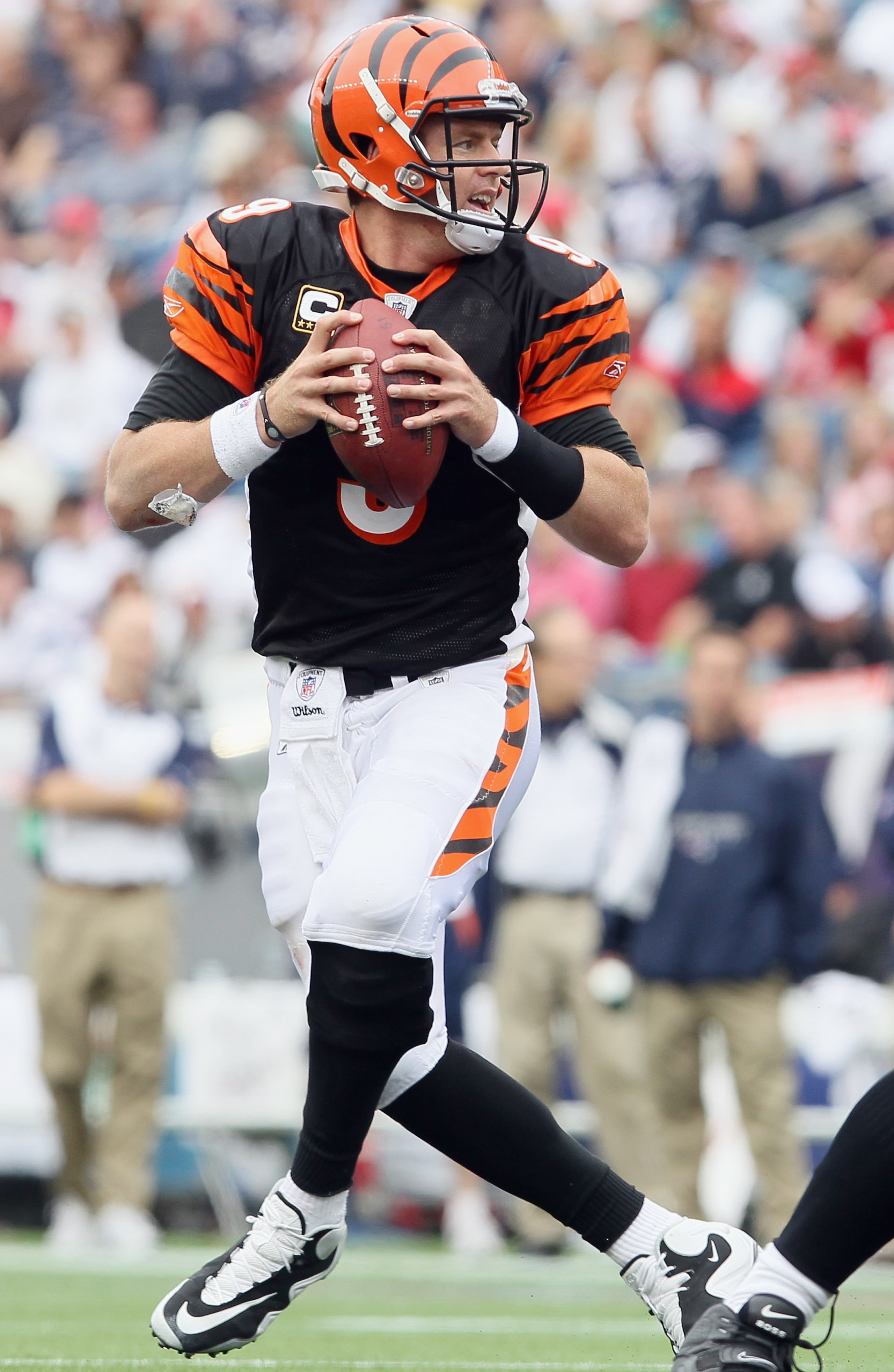 FOXBORO, MA - SEPTEMBER 12:  Carson Palmer #9 of the Cincinnati Bengals looks to pass against the New England Patriots during the NFL season opener on September 12, 2010 at Gillette Stadium in Foxboro, Massachusetts. The Patriots defeated the Bengals 38-2