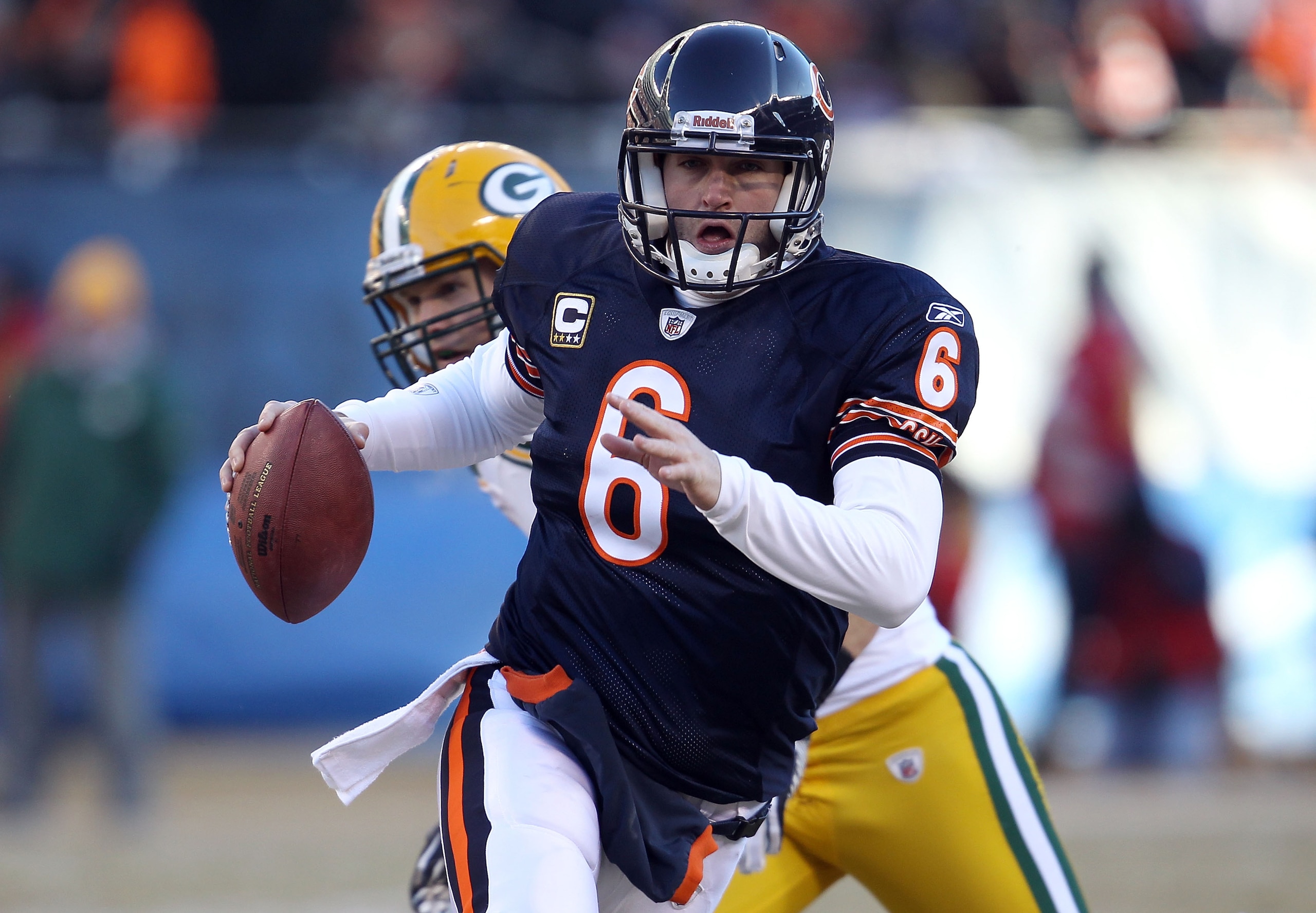 CHICAGO, IL - JANUARY 23: Quarterback Jay Cutler #6 of the Chicago Bears runs the ball ahead of Clay Matthews #52 of the Green Bay Packers in the second quarter of the NFC Championship Game at Soldier Field on January 23, 2011 in Chicago, Illinois. (Pho CHICAGO, IL - JANUARY 23: Quarterback Jay Cutler #6 of the Chicago Bears runs the ball ahead of Clay Matthews #52 of the Green Bay Packers in the second quarter of the NFC Championship Game at Soldier Field on January 23, 2011 in Chicago, Illinois. (Pho