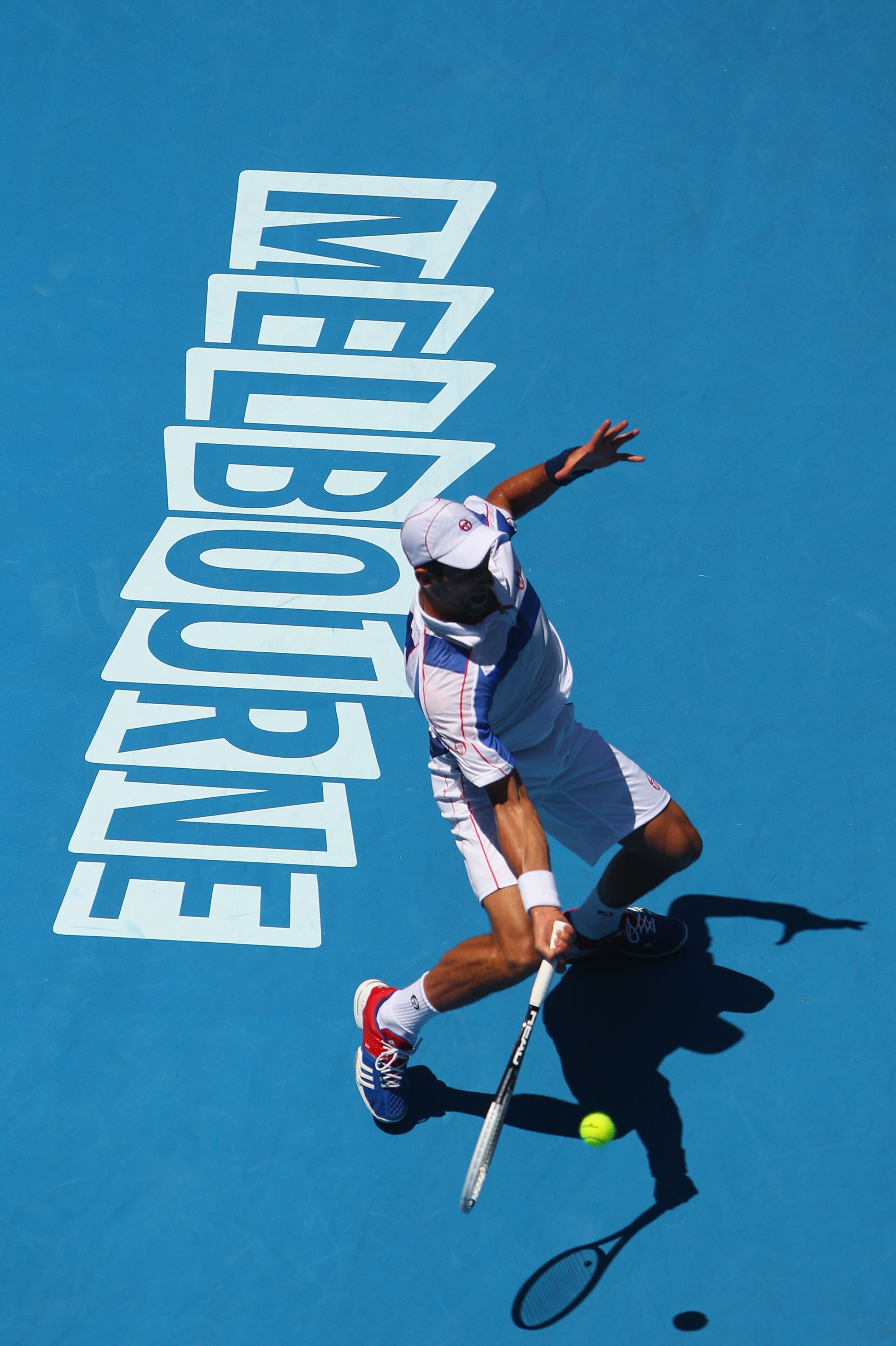 MELBOURNE, AUSTRALIA - JANUARY 23:  Novak Djokovic of Serbia plays a forehand in his fourth round match against Nicolas Almagro of Spain during day seven of the 2011 Australian Open at Melbourne Park on January 23, 2011 in Melbourne, Australia.  (Photo by