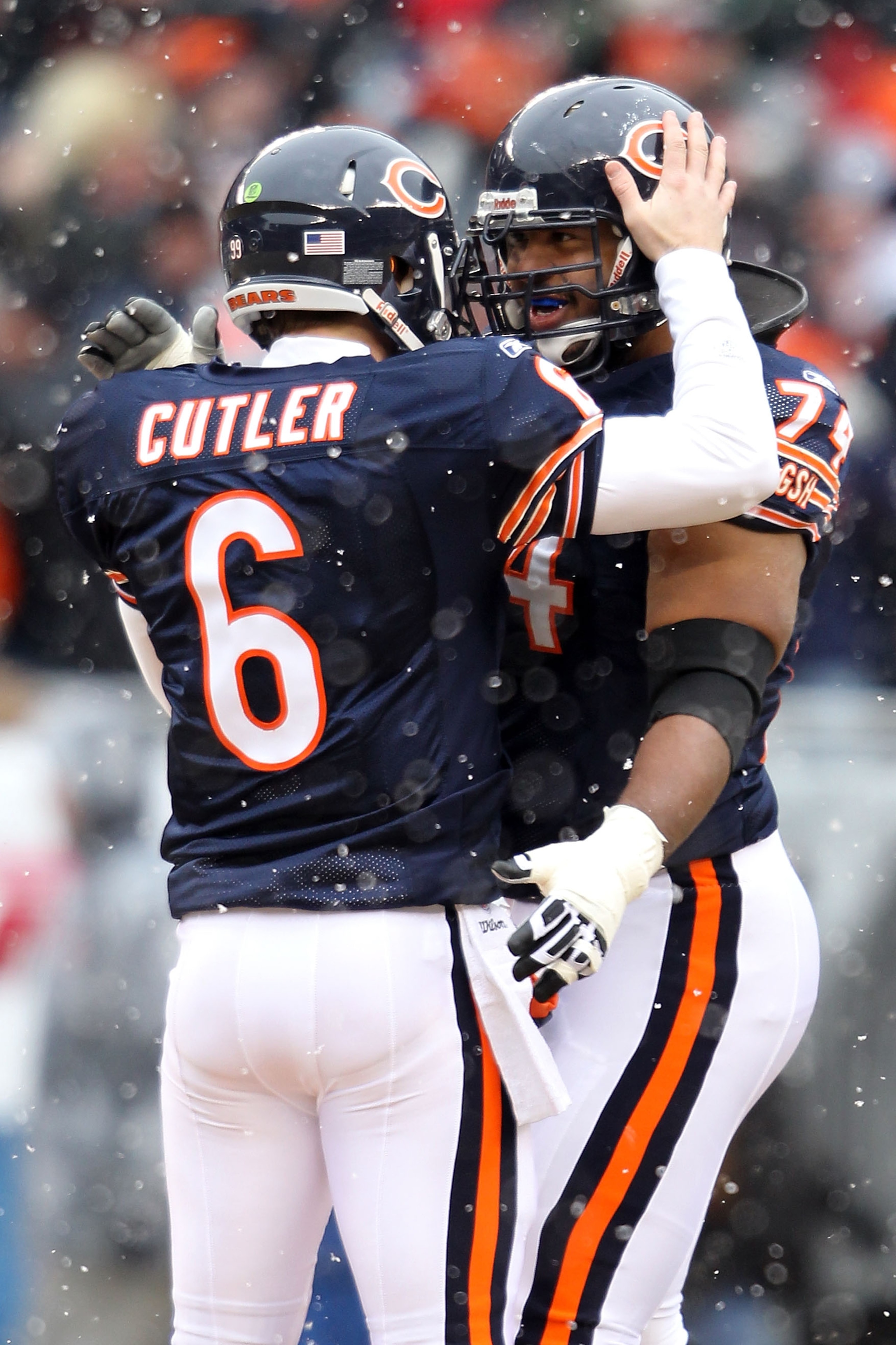 CHICAGO, IL - JANUARY 16: Quarterback Jay Cutler #6 of the Chicago Bears celebrates his 58-yard touchdown pass in the first quarter with Chris Williams #74 against the Seattle Seahawks in the 2011 NFC divisional playoff game at Soldier Field on January 1 CHICAGO, IL - JANUARY 16: Quarterback Jay Cutler #6 of the Chicago Bears celebrates his 58-yard touchdown pass in the first quarter with Chris Williams #74 against the Seattle Seahawks in the 2011 NFC divisional playoff game at Soldier Field on January 1